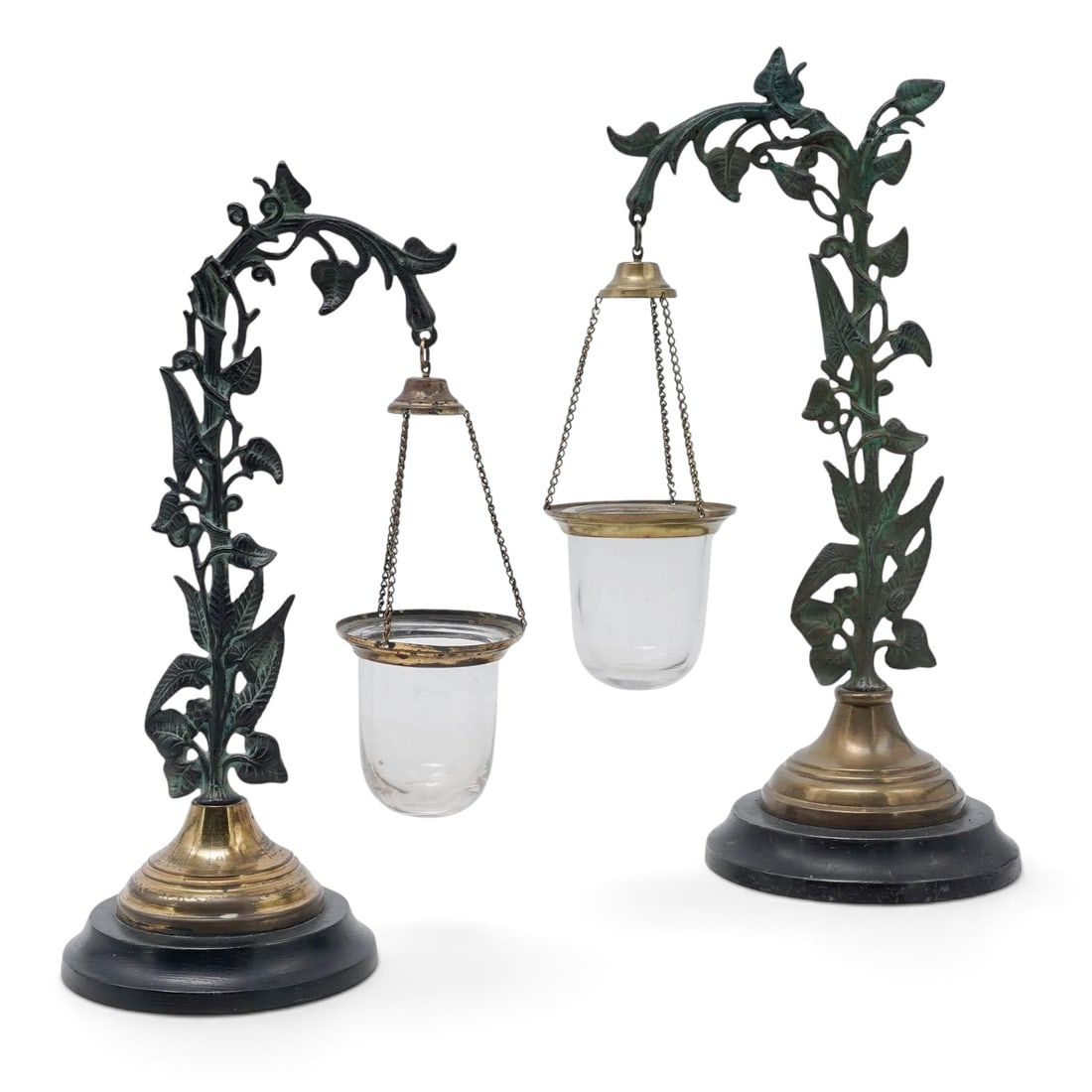 Pair of Bronze Vine and Glass Votive Stands: Pair of Bronze Vine and Glass Votive Stands 20th century Pair bronze vine votive stands, feature a vine design holding a glass votive. H 10.5" x W 5.25"