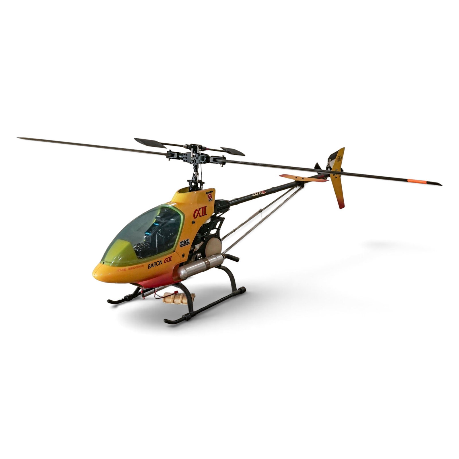 Kalt Baron Alpha II Radio-Controlled Helicopter with Hatori Tuning: Kalt Baron Alpha II Radio-Controlled Helicopter with Hatori Tuning Late 20th century, Japanese Engineered by Kalt Sangyo, a pioneering Japanese manufacturer, this classic model represents the peak of 