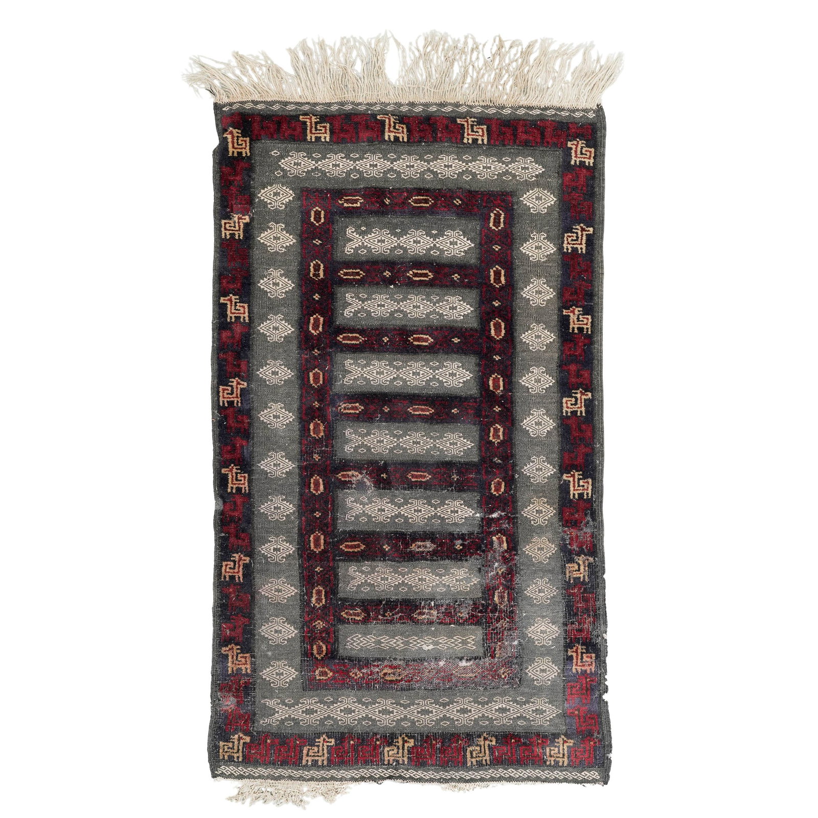 Antique Baluchi Tribal Wool Rug: Antique Baluchi Tribal Wool Rug Early 20th century Baluchi tribal wool rug decorated with medallion motifs. Provenance: Private Estate NY, NY L (w/o tassels) 55" x W 30.25"