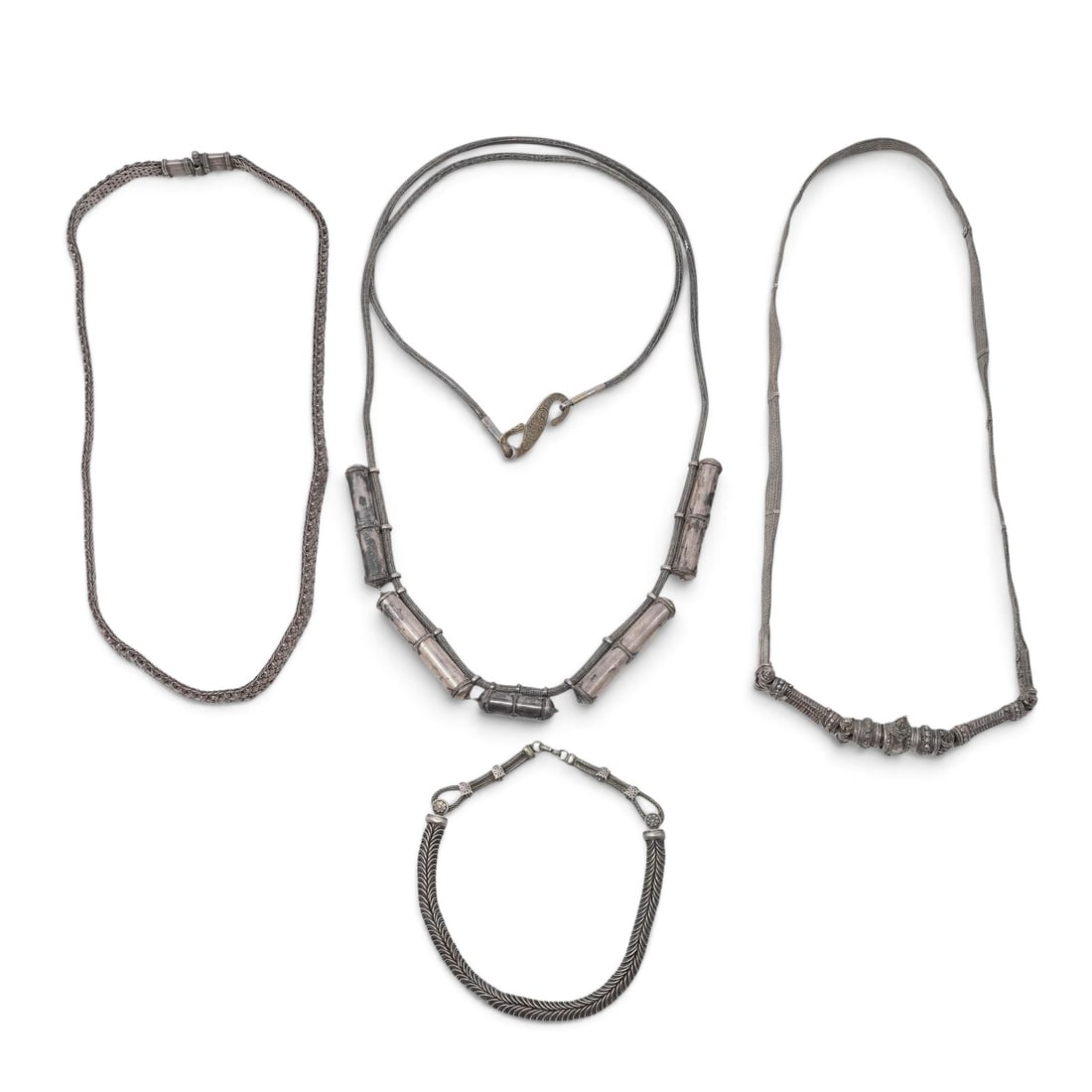 Group of Rajasthani Indian Necklaces: Group of Rajasthani Indian Necklaces 19th-20th century, Indian Group of Rajasthani Indian silver necklaces. Total weight: 774 grams. Provenance: Private Estate NY, NY L (clasped) 7"-28"