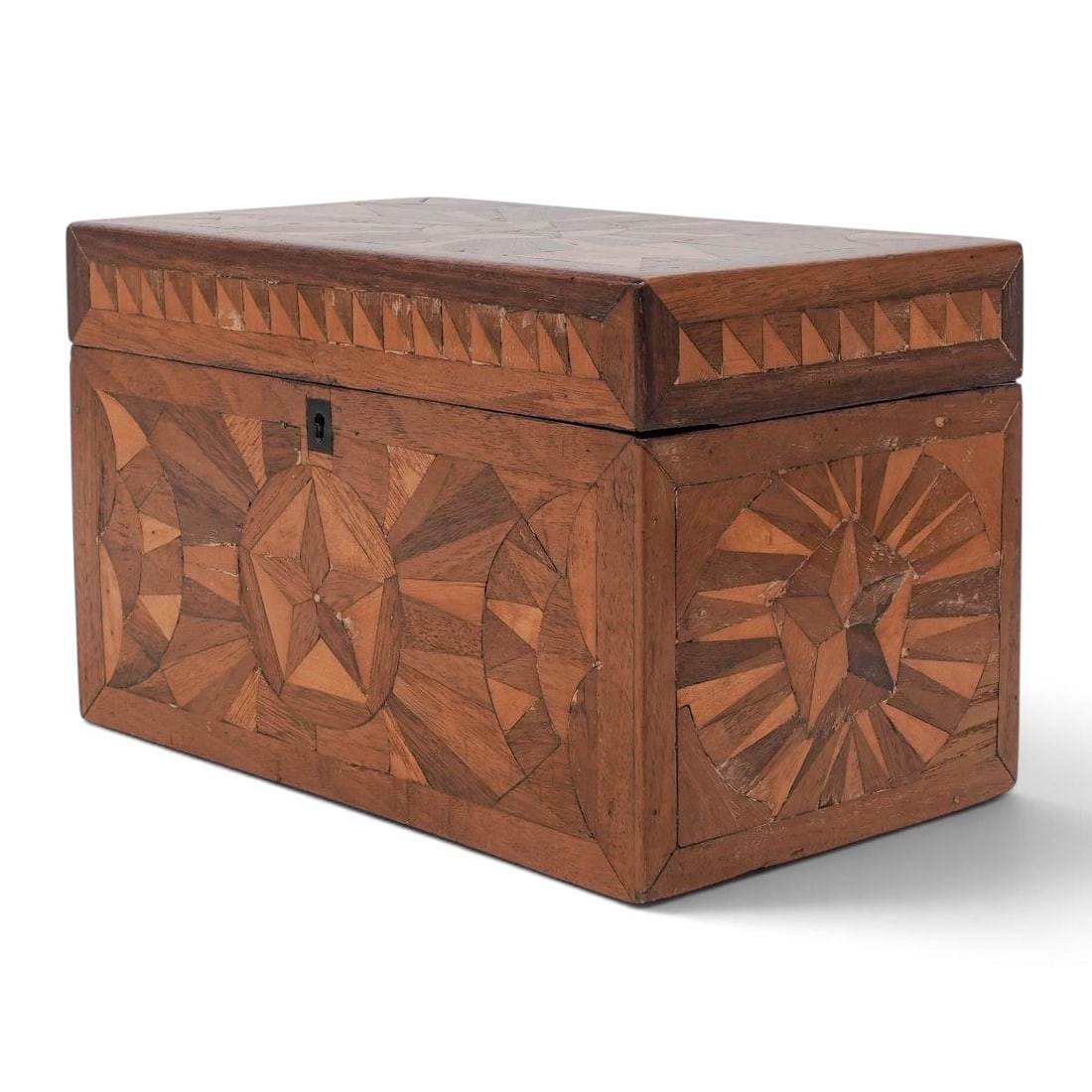 Antique Marquetry Inlaid Wood Box: Antique Marquetry Inlaid Wood Box Early 20th Century, Europe An antique rectangular wooden box with hinged lid, elaborately decorated throughout with geometric marquetry in contrasting natural wood to