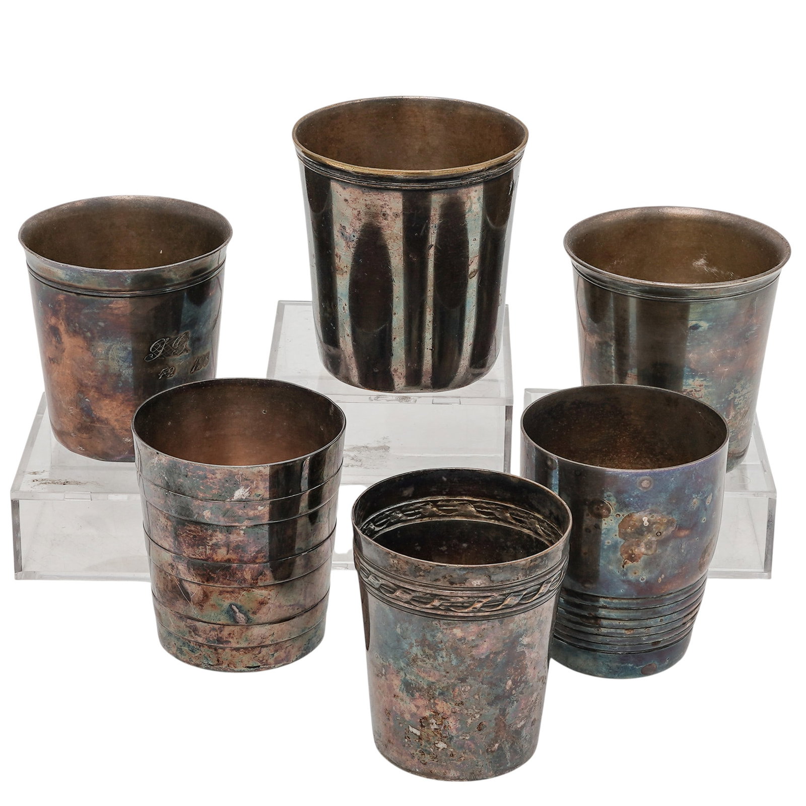 (6 pc) Antique French Silver Plated Cups: (6 pc) Antique French Silver Plated Cups Late 19th Century, French A six-piece grouping of French silver plated cups, each of cylindrical form with slightly flared rims and rounded footed bases. The c