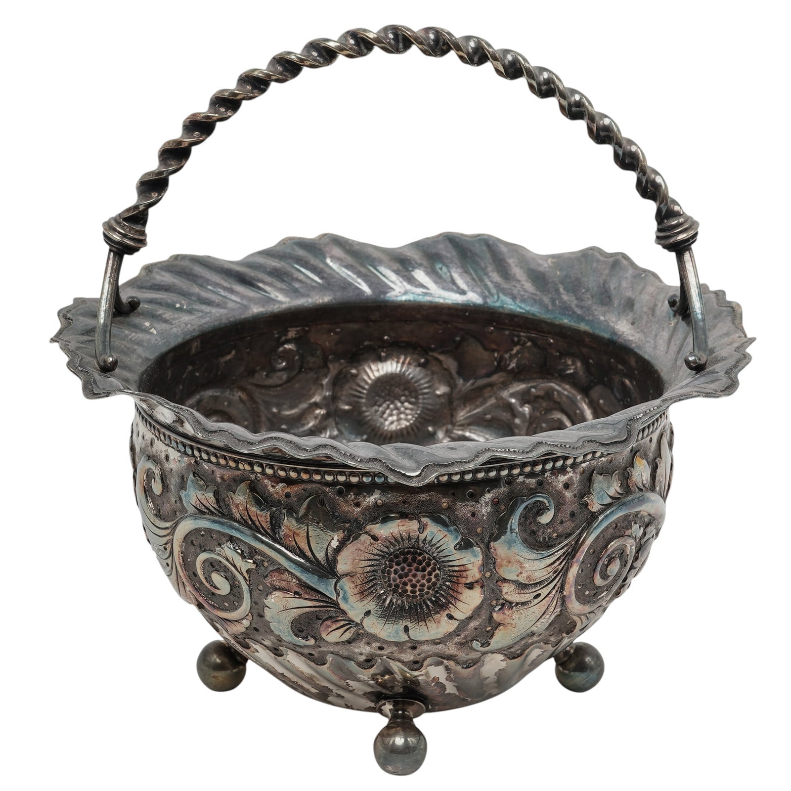 Antique Derby Silver Co. Silver Plated Bride's Basket: Antique Derby Silver Co. Silver Plated Bride's Basket c. 1875–1898, USA Vintage silver-plated footed bowl, features ornate repoussé floral motifs, a scalloped and fluted rim, four ball feet, and a