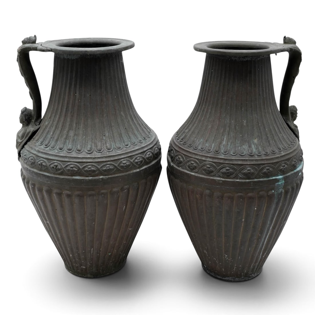Pair Neoclassical-Style Cast Brass Mantel Ewers: Pair Neoclassical-Style Cast Brass Mantel Ewers Mid 20th Cent. A pair of Vintage Neoclassical cast-metal mantel ewers featuring an ornate, high-arched handle sculpted in the likeness of a classical