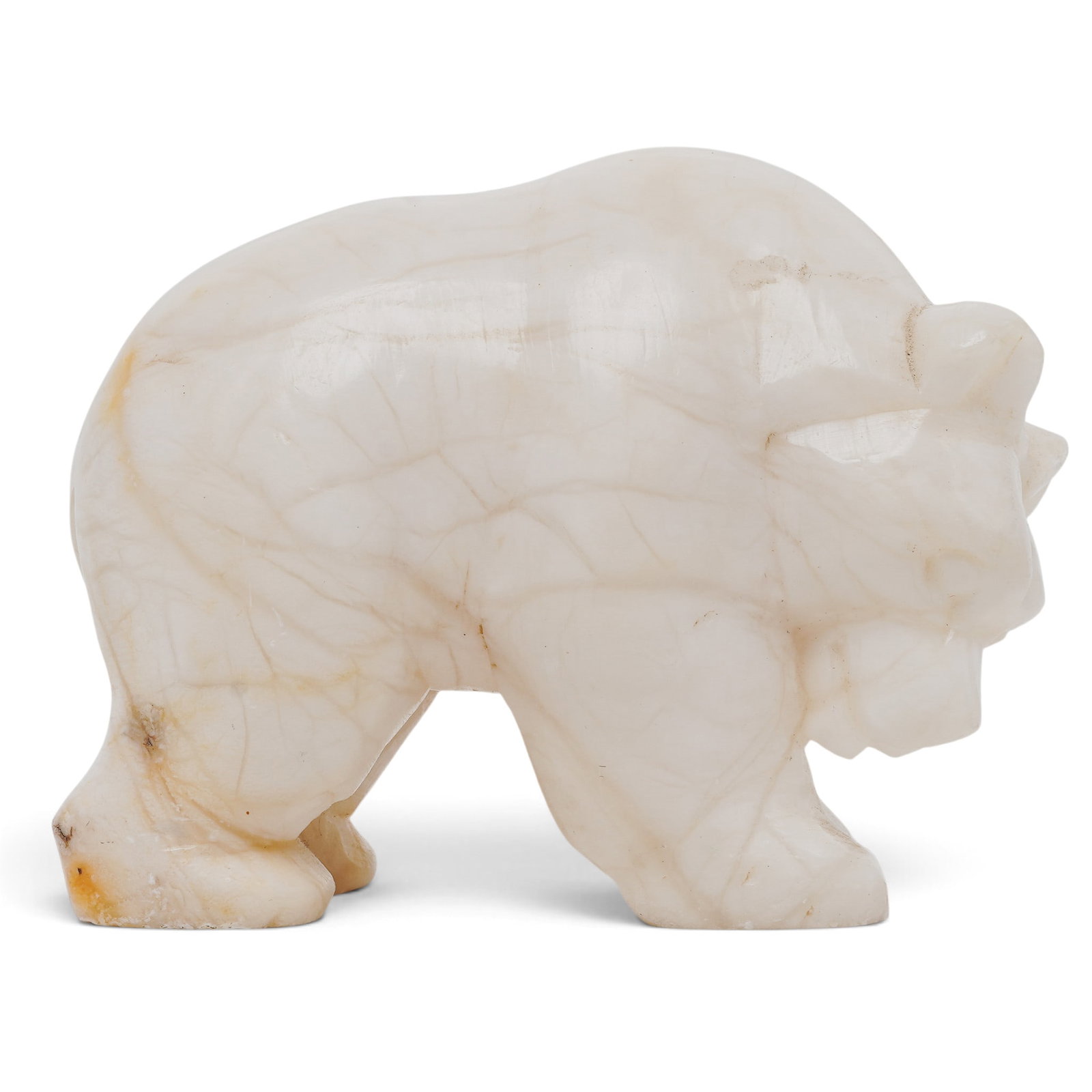 Vintage Hand-Carved Alabaster Polar Bear Sculpture: Vintage Hand-Carved Alabaster Polar Bear Sculpture Mid 20th Cent. The sculpture depicts a robust polar bear on the prowl with a heavily arched back and a lowered head, a classic composition meant to c