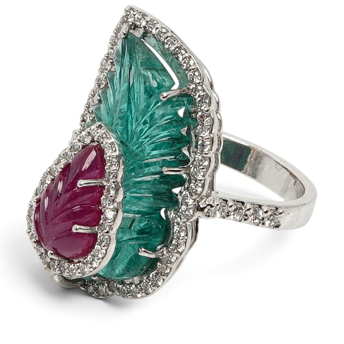 18K Gold Carved Emerald Ruby & Diamond Tutti Frutti Ring: 18K Gold Carved Emerald Ruby & Diamond Tutti Frutti Ring Contemporary 18K white gold ring with a carved green emerald leaf, raised carved ruby leaf and diamond frame and shoulders. Stones: Approx. 7.0