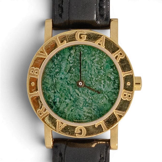Bvlgari Bvlgari 18k Gold Jade Dial Watch REF BB26DGL: Bvlgari Bvlgari 18k Gold Jade Dial Watch REF BB26DGL 2000, Swiss Bvlgari Bvlgari ladies quartz wristwatch in 18k yellow gold with engraved double-logo bezel, striking jade dial, black Bvlgari leather 