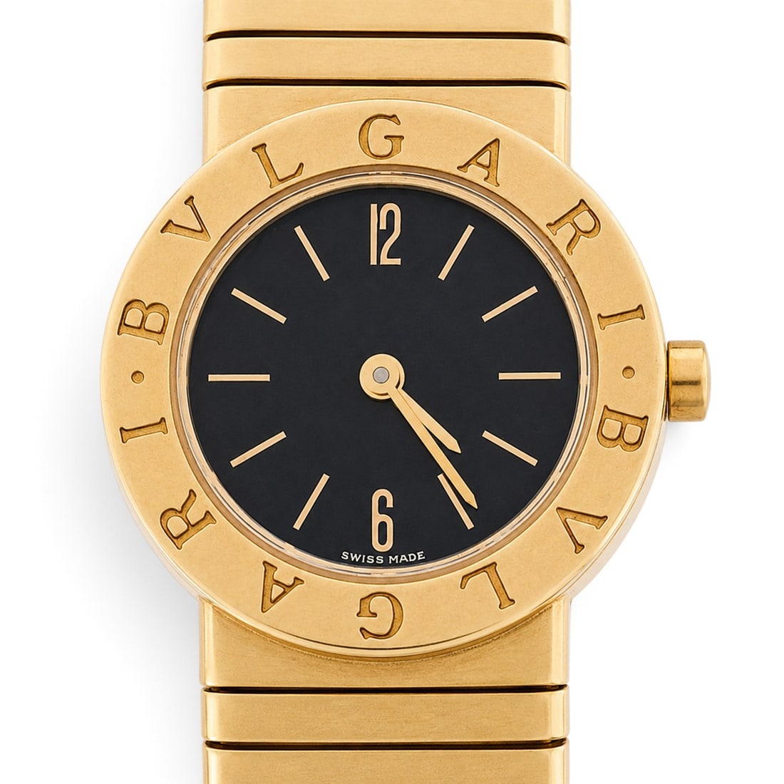 Bvlgari "Tubogas" 18K Gold Quartz Watch REF BB 23 2T: Bvlgari "Tubogas" 18K Gold Quartz Watch REF BB 23 2T 1990s, Swiss Bvlgari Bulgari Tubogas ladies quartz wristwatch with 18K yellow gold case, engraved Bvlgari bezel, black dial with Arabic 12 and 6 nu