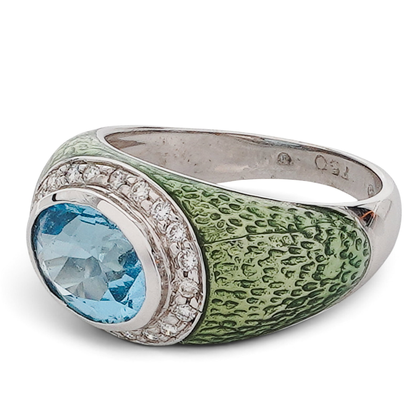 18K Gold Enamel Blue Topaz & Diamond Ring: 18K Gold Enamel Blue Topaz & Diamond Ring 2000s - 2010s 18K white gold ring with green enamel shank, pavé diamond bezel, and an approx. 2.50 ct oval blue topaz center, accented with approx. 0.20 ctw 