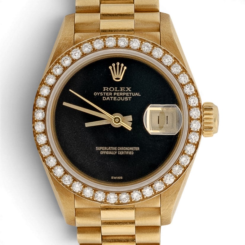 Rolex Ladies Datejust 18K Gold Onyx Diamond Watch REF 69138: Rolex Ladies Datejust 18K Gold Onyx Diamond Watch REF 69138 Late 1980s, Swiss Rolex Ladies Datejust in 18K gold with limited black onyx factory dial, date aperture, factory diamond bezel, and Presiden