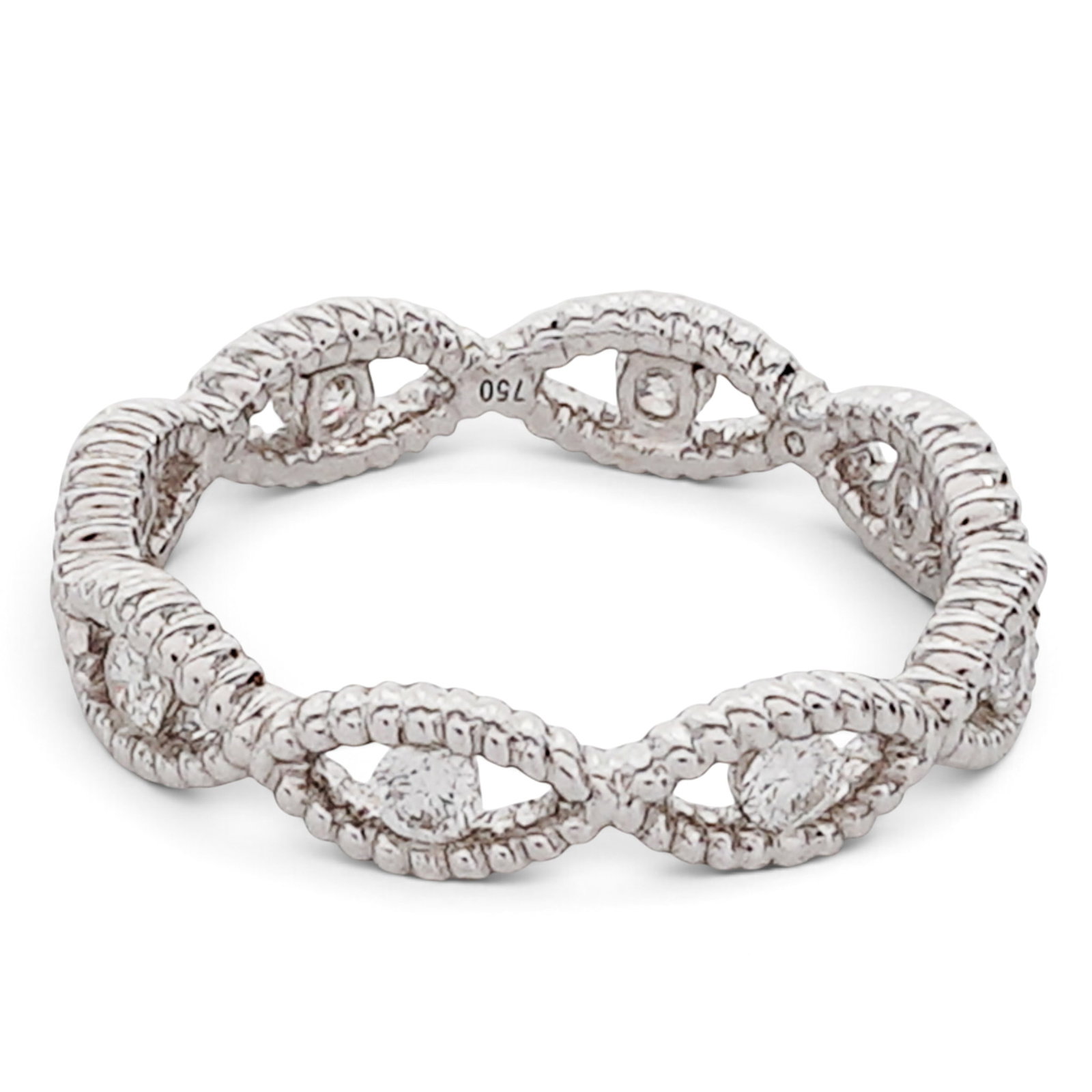 Hidalgo 18K Gold Diamond Station Band: Hidalgo 18K Gold Diamond Station Band 2000s, USA Hidalgo 18K white gold openwork diamond station band set with approx. 0.70 ctw round diamonds. Marked for Hidalgo and 750. Weight: 3.17 Grams. (2.04 dw
