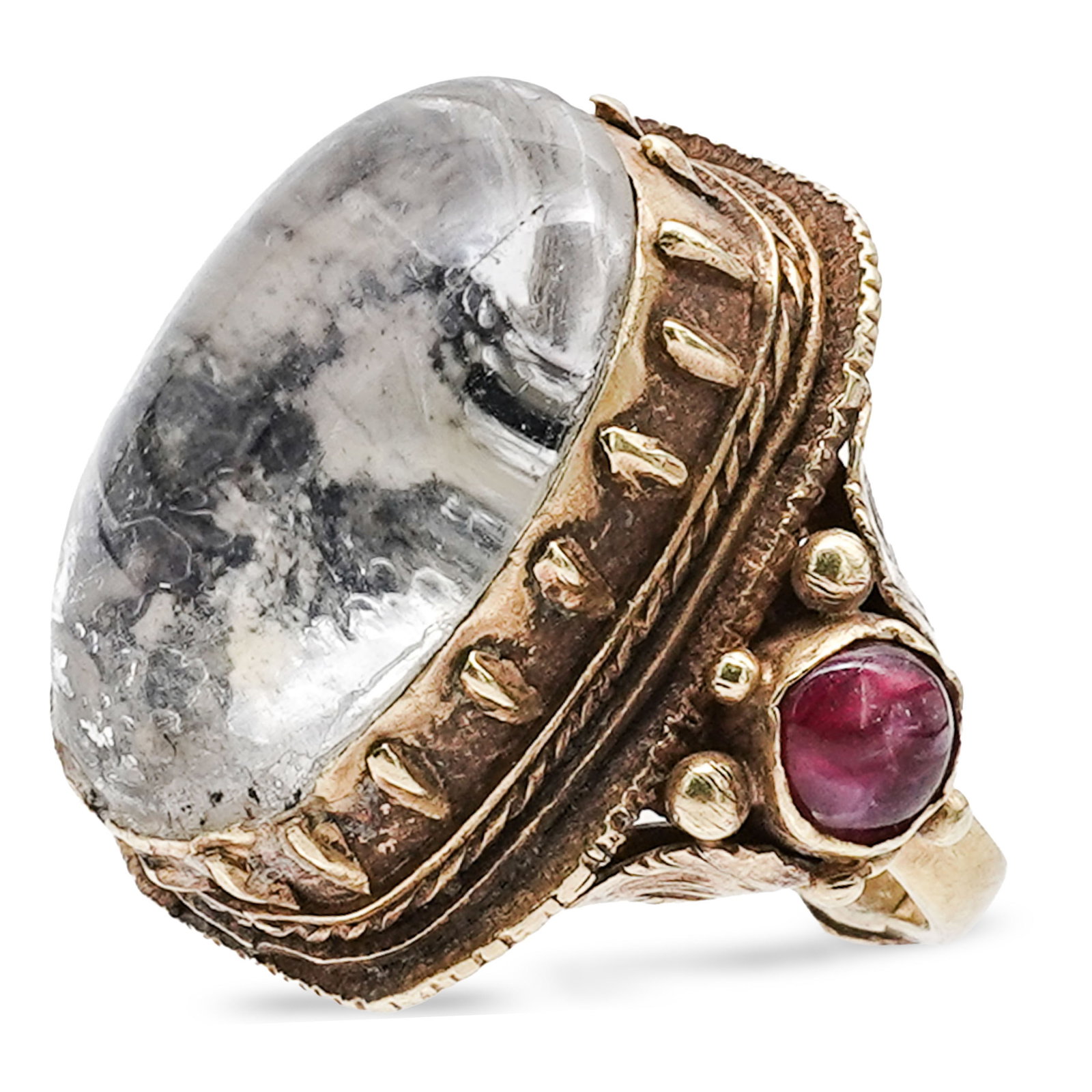 Antique 18K Gold Rock Crystal & Ruby Ring: Antique 18K Gold Rock Crystal & Ruby Ring 19th Century 18K yellow gold cocktail ring with large oval cabochon rock crystal center, ribbed bezel setting, textured gold shoulders, and small cabochon rub