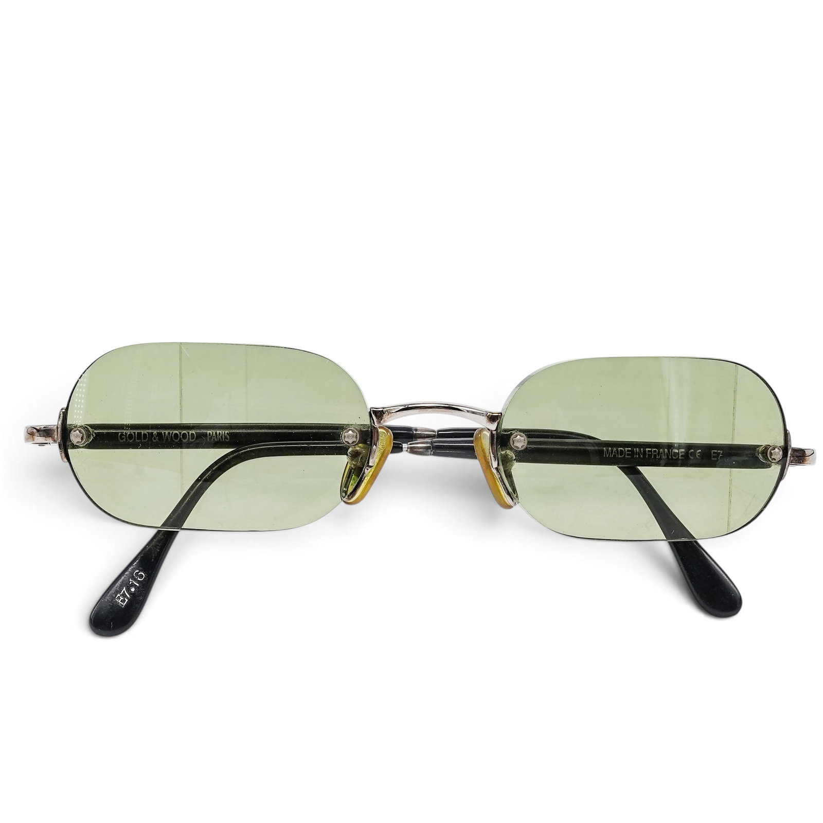 Gold & Wood Green Rimless Wood Eyeglasses: Gold & Wood Green Rimless Wood Eyeglasses 2000's, Luxembourg Gold & Wood Green Wood Eyeglasses with green wood detailing and a rimless silhouette.