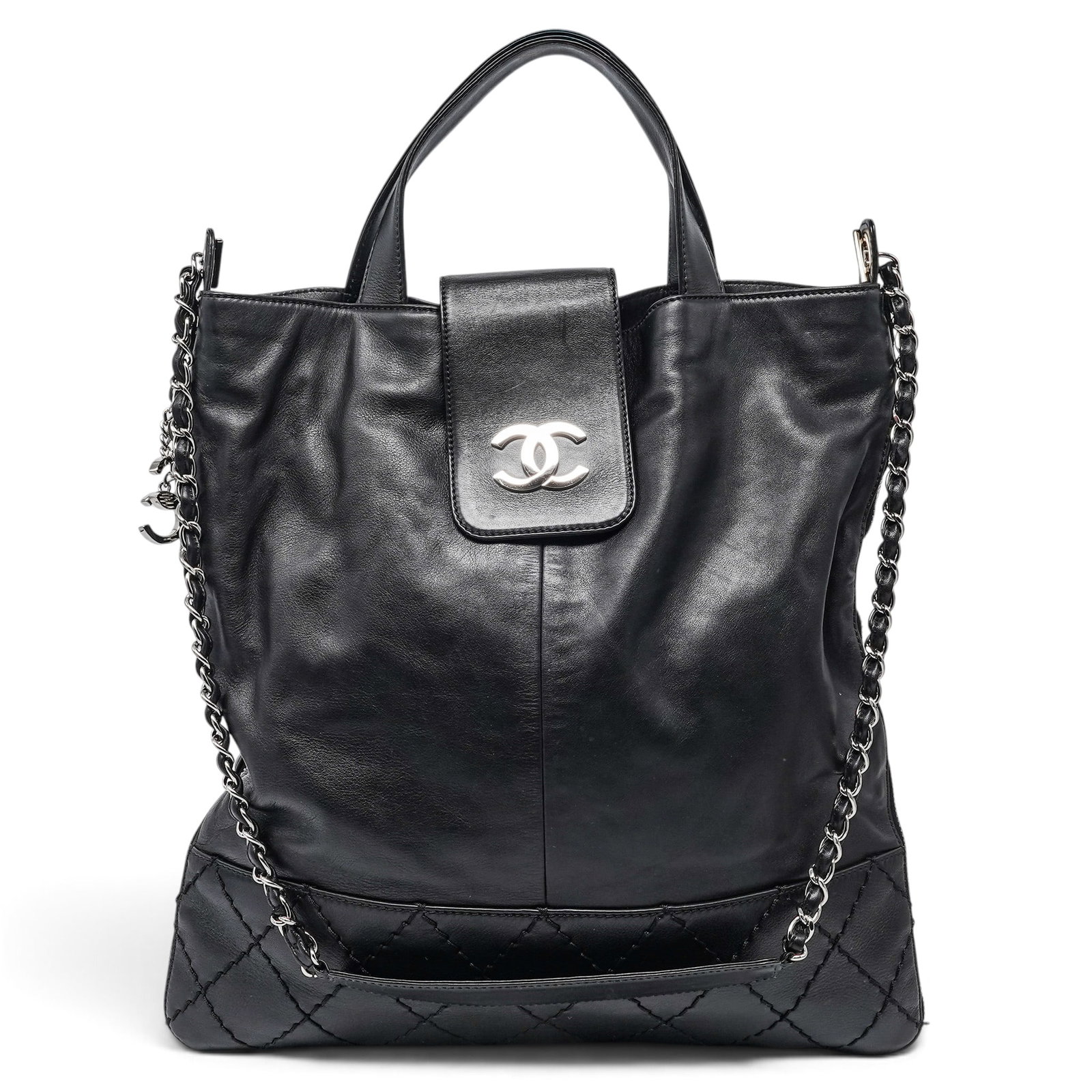 Chanel CC Logo Expandable Tote Black Lambskin: Chanel CC Logo Expandable Tote Black Lambskin 2010's, Italy Chanel CC Tote crafted from black lambskin, featuring the signature CC logo, CC zippers, and fold-over design. Date code missing. Verified