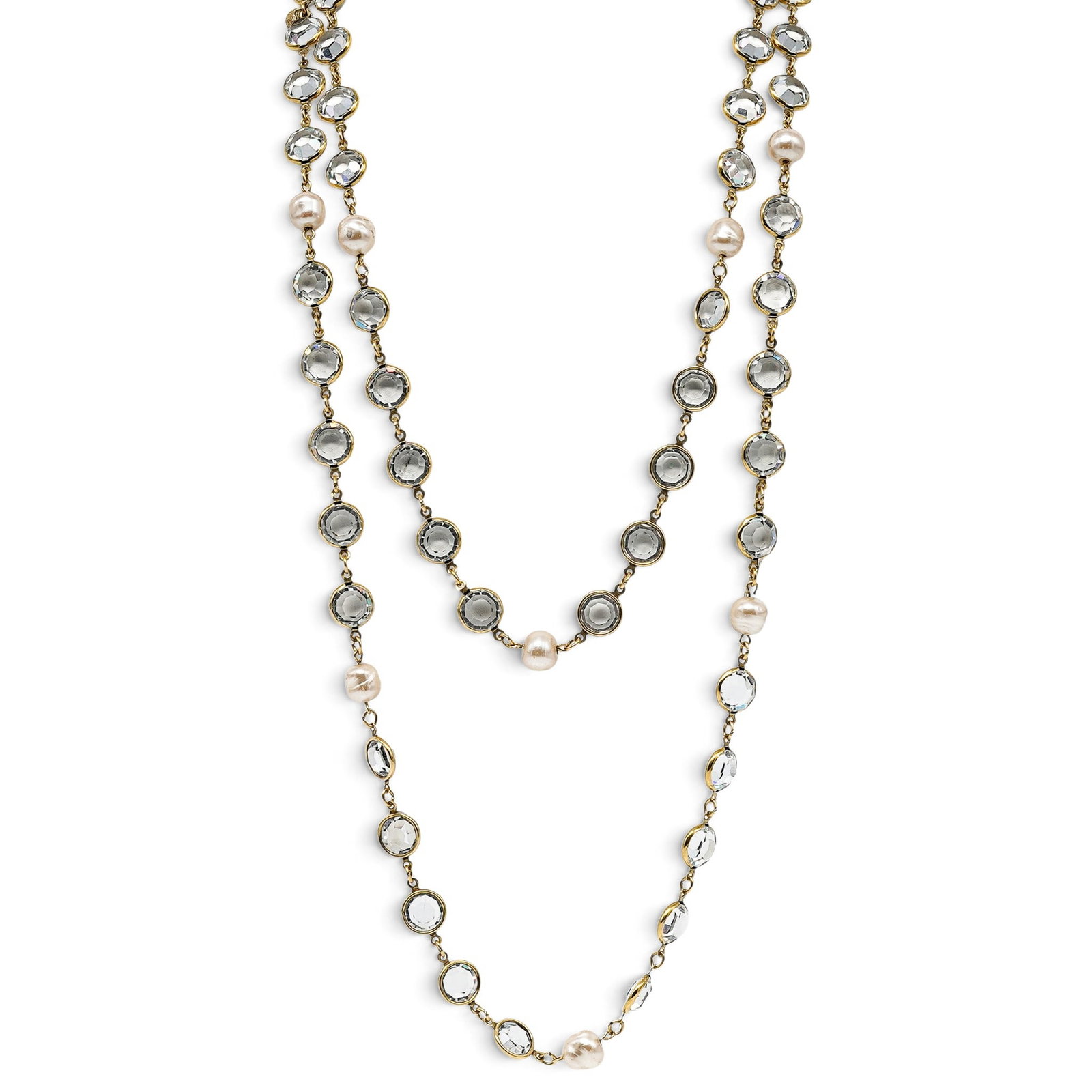 Chanel Costume Pearl & Crystal Rhinestone Sautoir Necklace: Chanel Costume Pearl & Crystal Rhinestone Sautoir Necklace 1981, France Chanel Costume Pearl & Crystal Sautoir Necklace featuring long strands of faux pearls and faceted clear rhinestones. 56" Long
