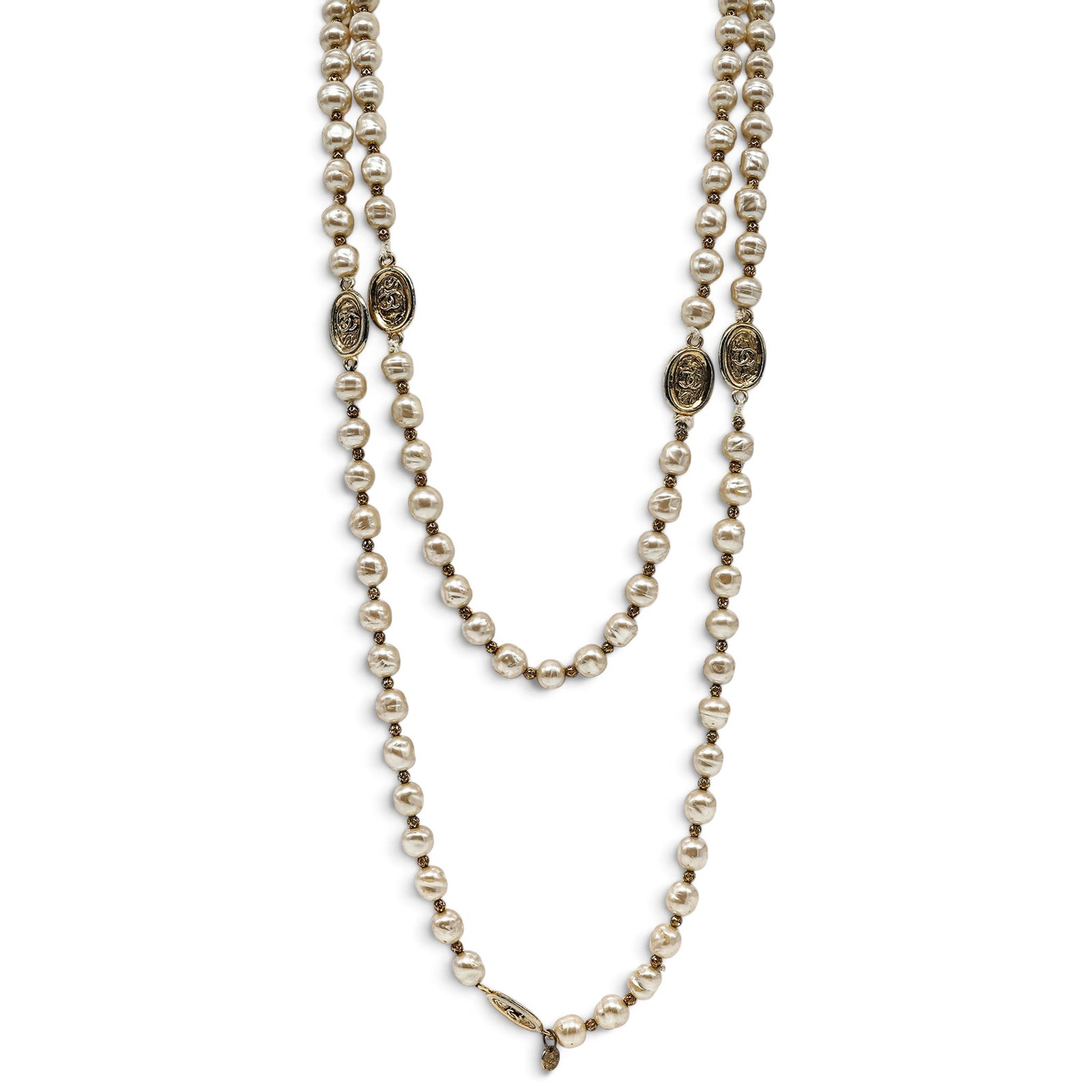 Chanel Long Costume Pearl Medallion Necklace: Chanel Long Costume Pearl Medallion Necklace 1981, France Chanel Multi-Strand Costume Pearl Medallion Necklace featuring multiple strands of faux pearls with a gold CC medallions throughout. 63" long