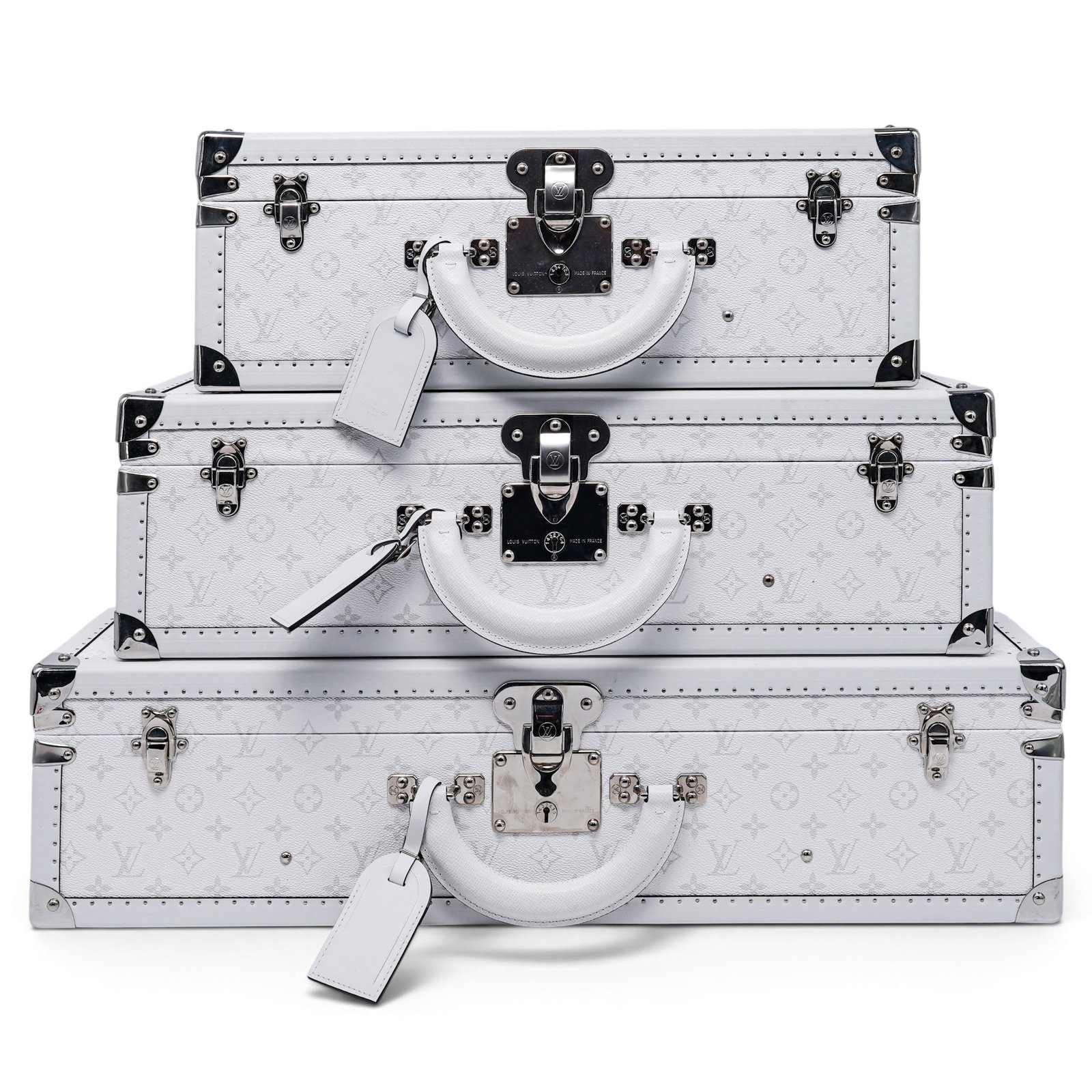 Louis Vuitton Custom White Monogram Bisten Trunk Set: Louis Vuitton Custom White Monogram Bisten Trunk Set 2020's, France Set of 3 Louis Vuitton White Monogram & Taiga Leather Bisten Suitcases. Signature Monogram canvas with Taiga leather trim in a class