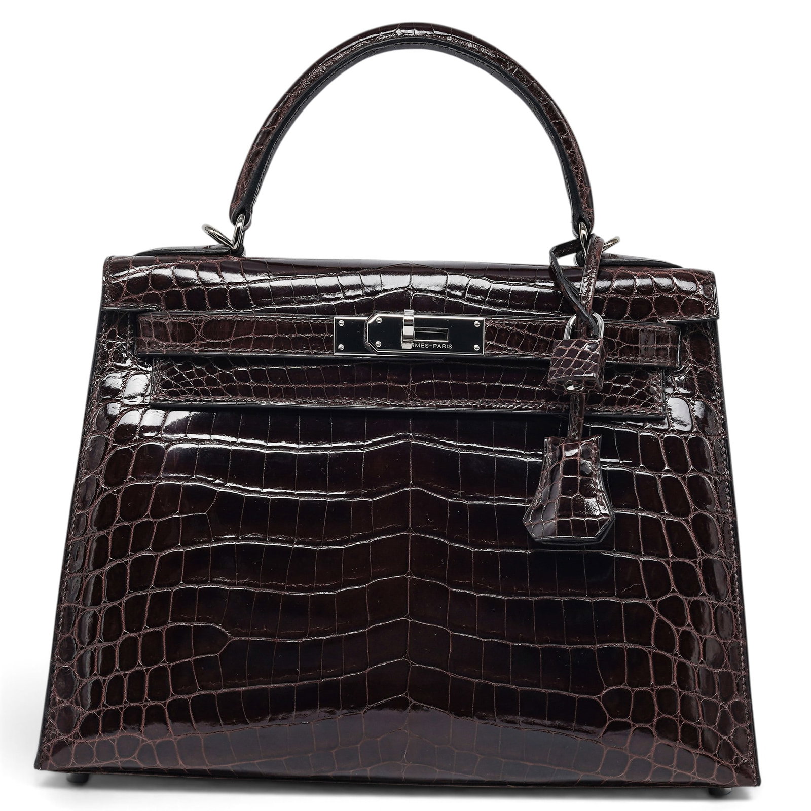 Hermes "Kelly" 28cm Sellier Cocoan Brown Shiny Niloticus Crocodile: Y Y Hermes "Kelly" 28cm Sellier Cocoan Brown Shiny Niloticus Crocodile K (2007), France Property of a Real Housewife of Miami, Lea Black. Hermès Kelly crafted from Niloticus crocodile in the rich
