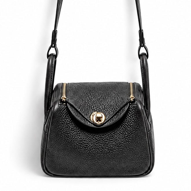Hermes "Mini Lindy" Ebene Clemence Leather Gold Hardware: Hermes "Mini Lindy" Ebene Clemence Leather Gold Hardware K (2025), France Hermès Mini Lindy crafted from Ebene Clemence leather with gold-plated hardware. Features the signature rounded silhouette, r