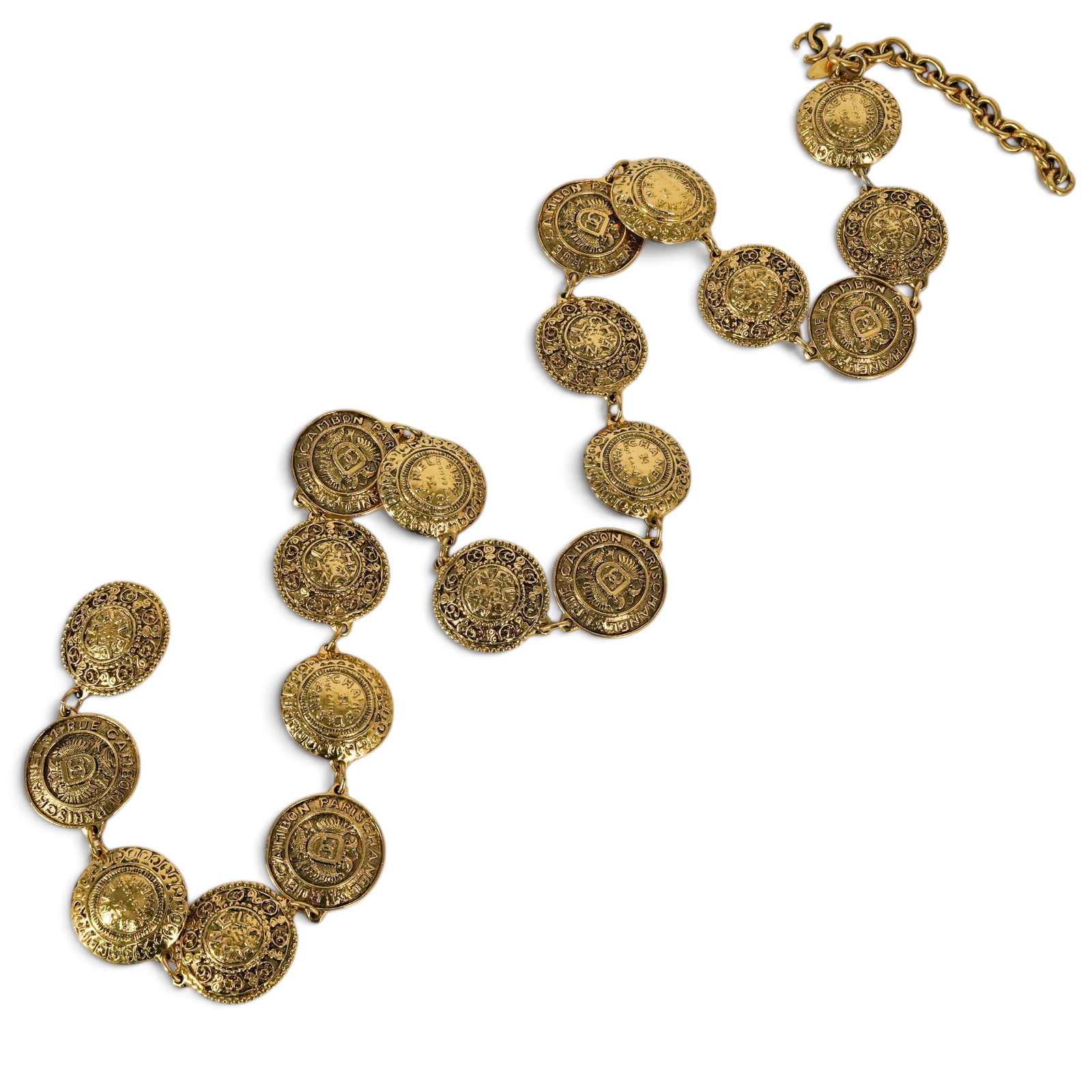 Chanel Gold-Tone Medallion Chain Link Belt: Chanel Gold-Tone Medallion Chain Link Belt 1990's, France Chanel gold-tone chain link belt designed with oversized textured medallion charms, coin-style roundels, and CC logo accents throughout.
