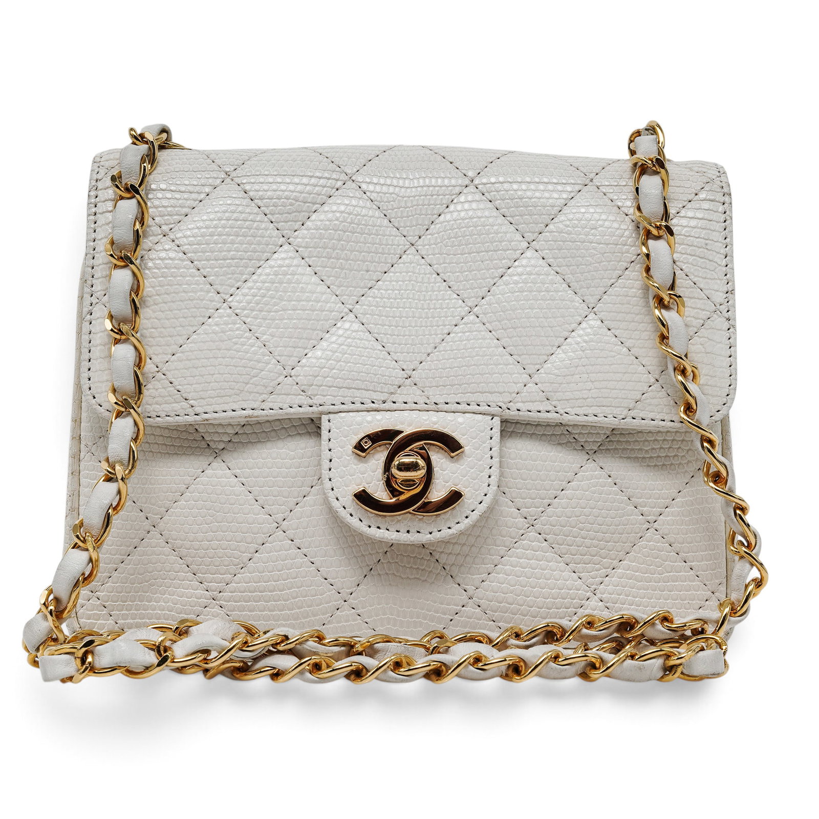 Chanel Square Mini Flap White Quilted Lizard Skin Bag: Chanel Square Mini Flap White Quilted Lizard Skin Bag 1997, France Property of a Real Housewife of Miami: Lea Black Chanel Square Mini Flap crafted from exotic white quilted lizard skin with 24k
