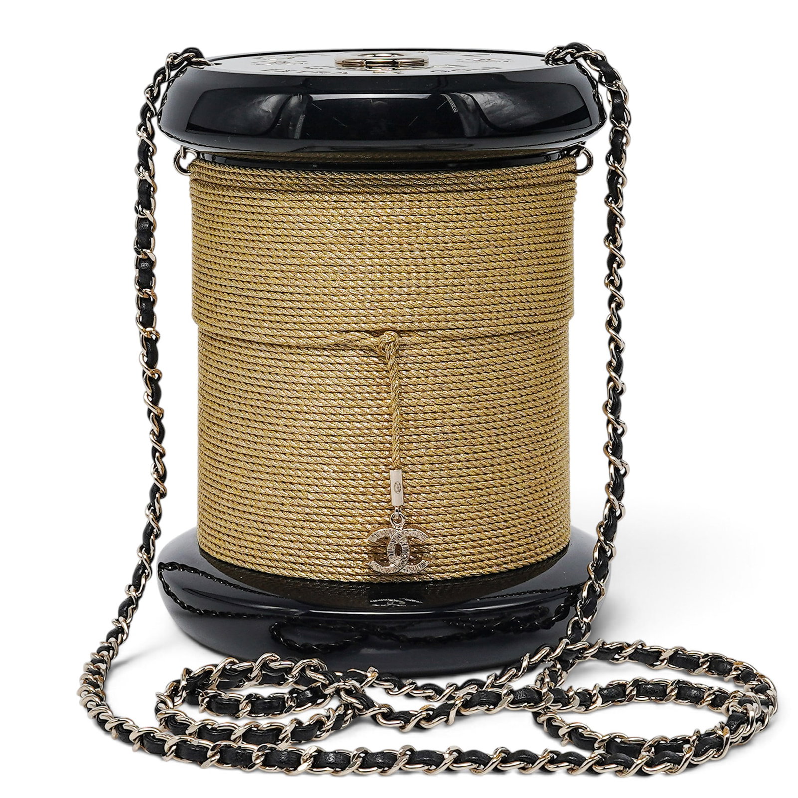 Chanel "Bobbin" Black Plexiglass Yarn Spool Minaudière: Chanel "Bobbin" Black Plexiglass Yarn Spool Minaudière 2017, Italy Chanel Fall 2016 Yarn Spool Minaudière, crafted in black plexiglass with gold thread and a leather-woven chain strap. A rare and