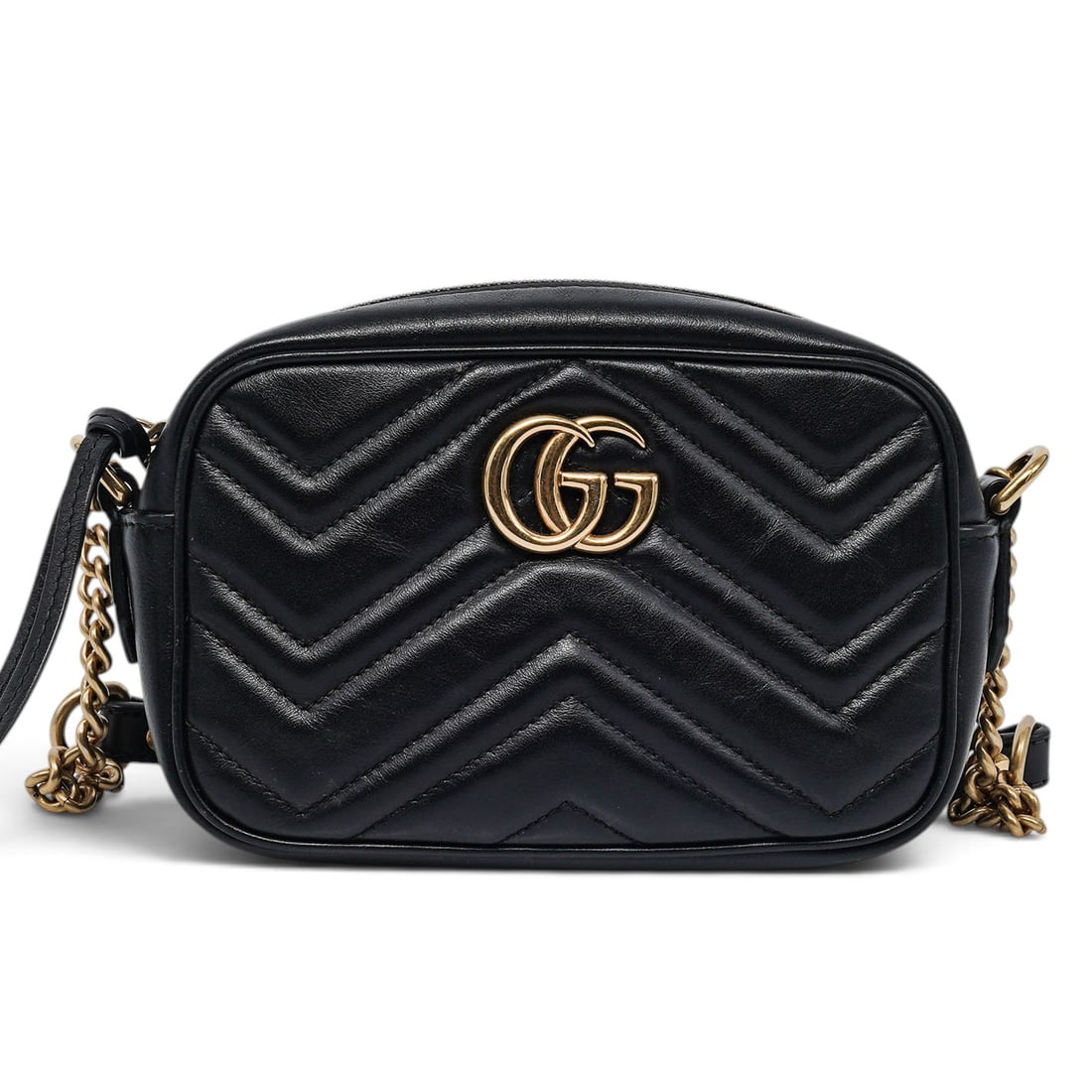 Gucci "Marmont" Small Black Leather Crossbody Bag: Gucci "Marmont" Small Black Leather Crossbody Bag 2020's, Italy Gucci “Marmont” Small Crossbody Bag crafted from black chevron quilted lambskin leather, featuring the signature gold GG logo, a