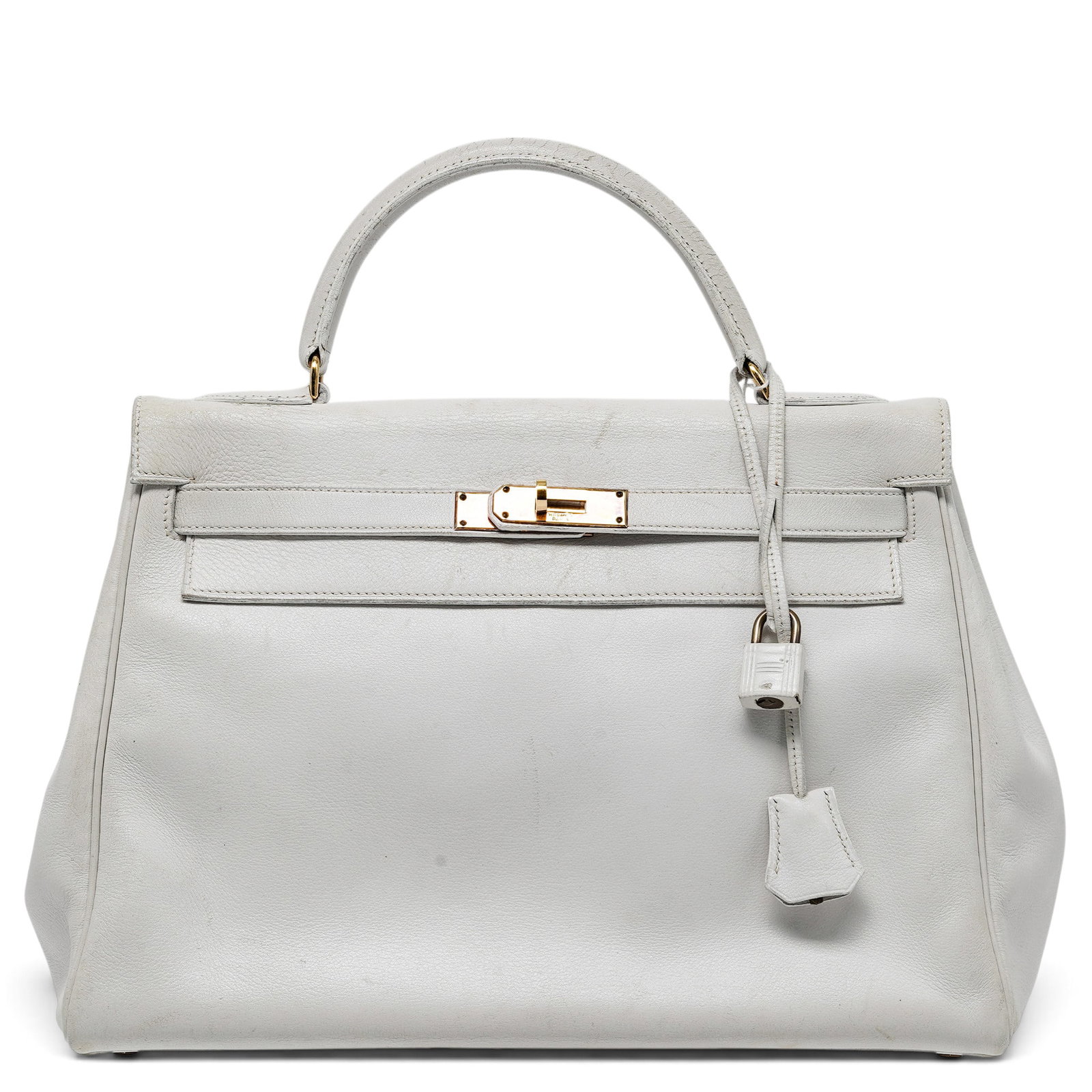 Hermes "Kelly" 32cm Retourne White Swift Leather Vintage: Hermes "Kelly" 32cm Retourne White Swift Leather Vintage B (1973), France Hermès Kelly crafted from white Swift leather in the Retourne style, featuring the signature turn-lock closure and structured