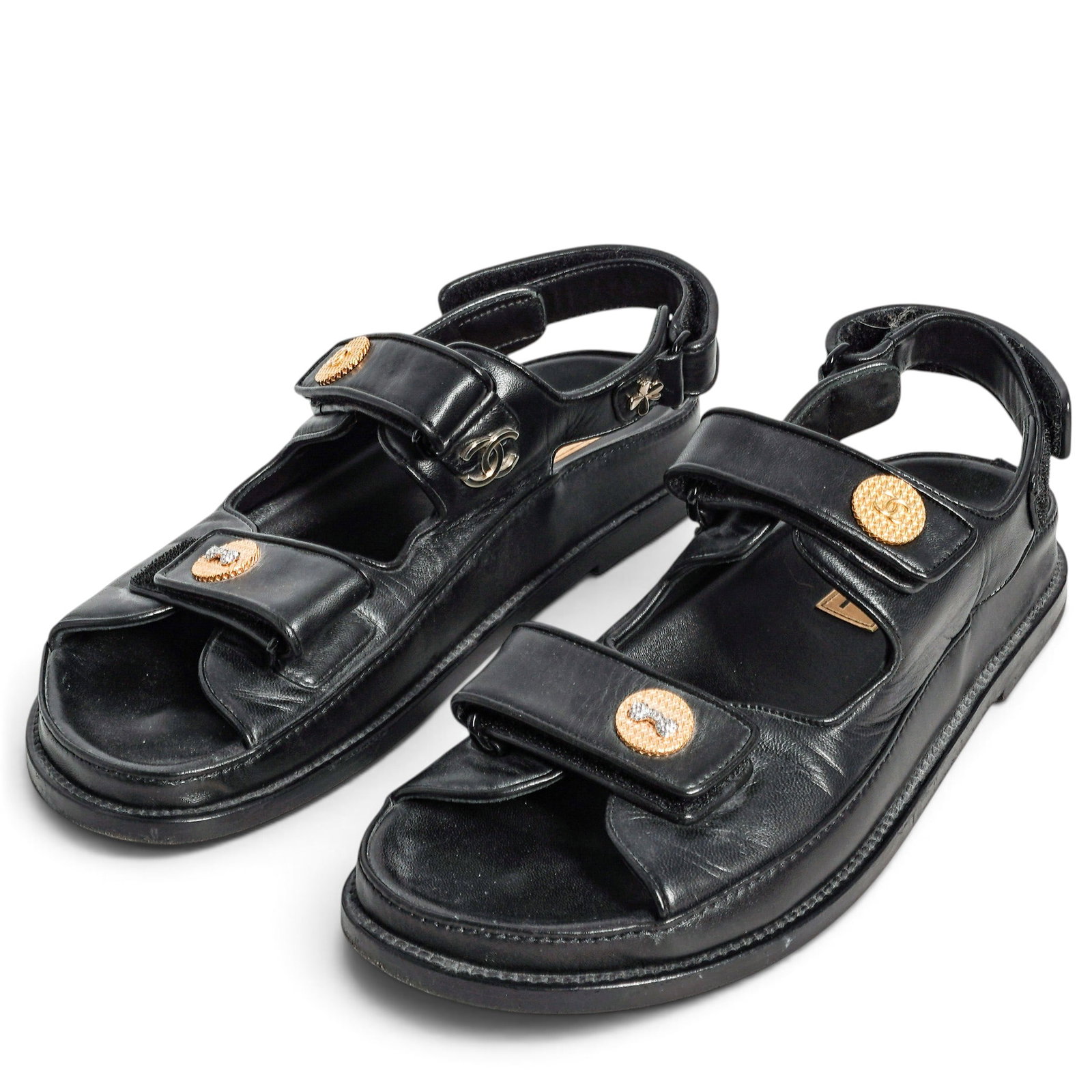 Chanel Black Leather "Dad" Sandals: Chanel Black Leather "Dad" Sandals 2020's, Italy Chanel Black Leather Velcro "Dad" Sandals featuring gold logo coin accents. Features adjustable hook-and-loop straps, a molded footbed with a metallic 