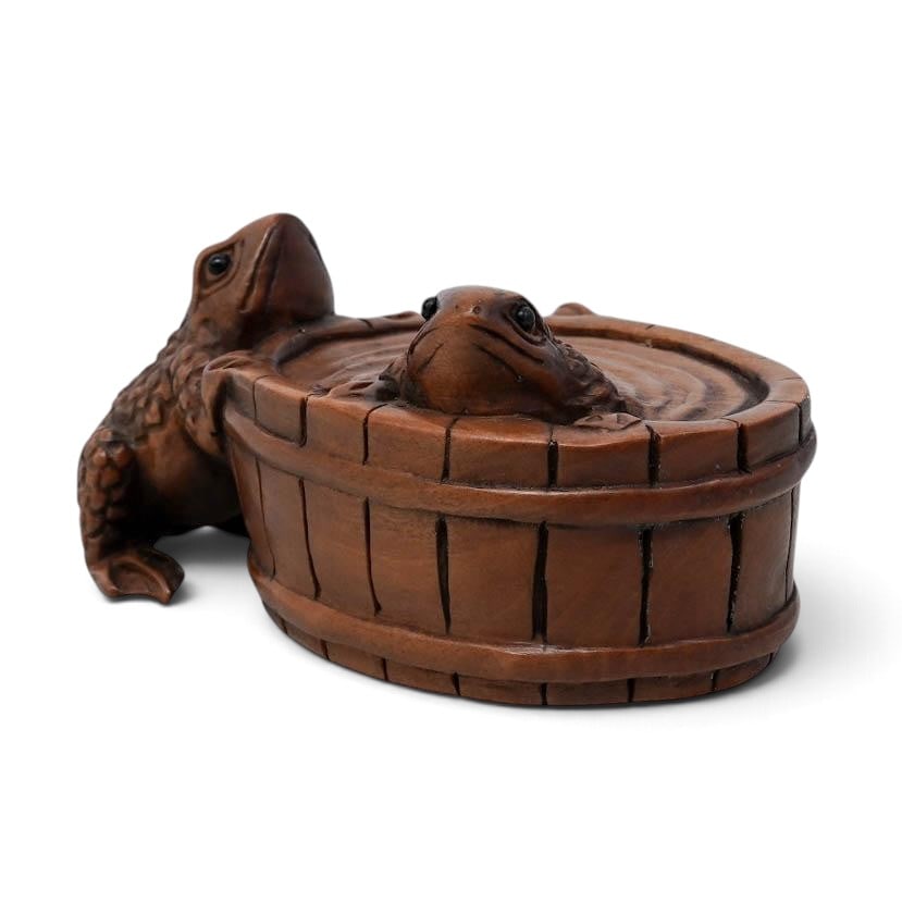 Antique Japanese Carved Wood Barrel of Frogs Netsuke, Signed: Antique Japanese Carved Wood Barrel of Frogs Netsuke, Signed Late 19th Century, China Artist/Designer/Manufacturer: Unknown Marking(s); notes: Signed with maker’s mark Materials: carved wood Catalog