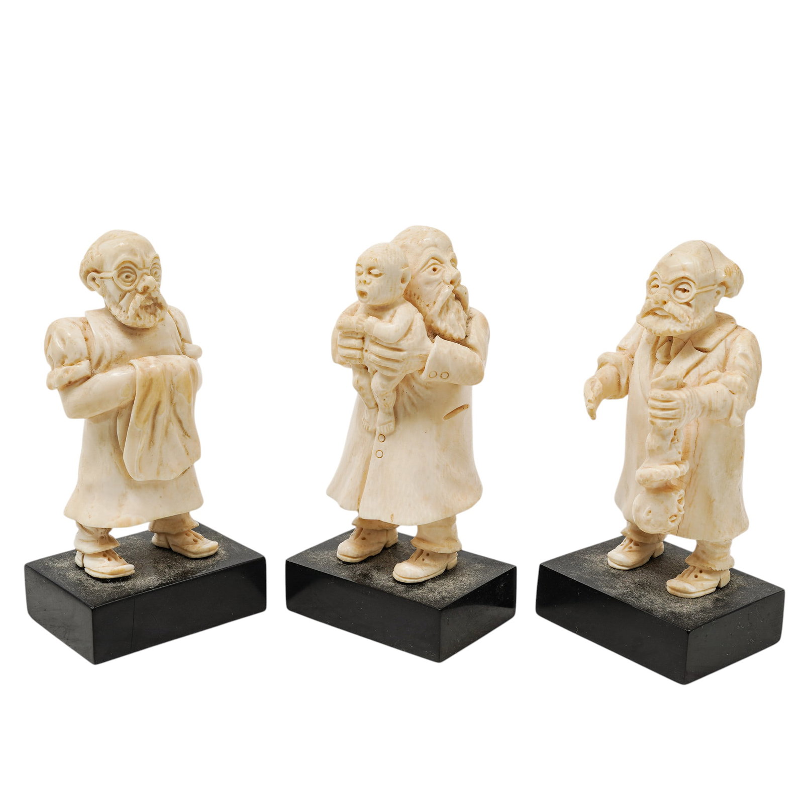 (3 pc) Antique European Carved Bone Doctor Figurines: (3 pc) Antique European Carved Bone Doctor Figurines 20th century, Europe Artist/Designer/Manufacturer: Unknown Marking(s); notes: none Materials: carved bone, wood Cataloger Note: Group of three