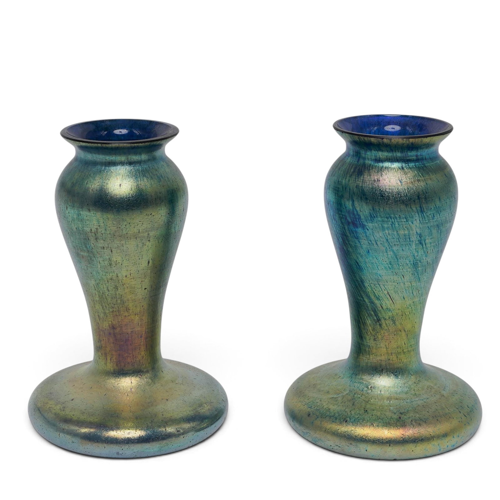 Pair of Art Nouveau Iridescent Glass Bud Vases: Pair of Art Nouveau Iridescent Glass Bud Vases Late 19th-Early 20th Century, Czech Republic Artist/Designer/Manufacturer: Unknown. Marking(s): None. Materials: Art glass. Cataloger Note: Matching pair