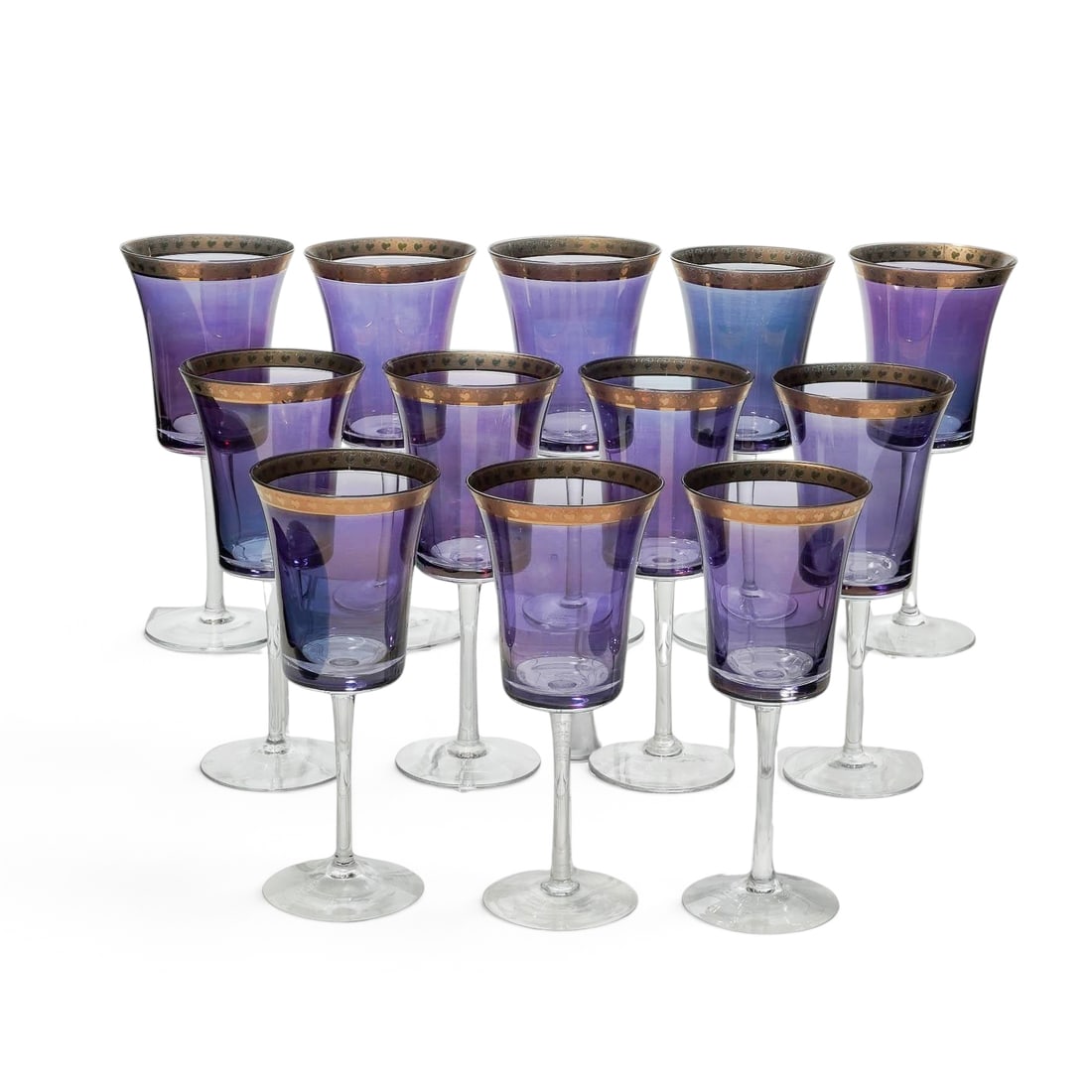 (12 pc) Vintage Polish Gilt & Purple Iridescent Glasses: (12 pc) Vintage Polish Gilt & Purple Iridescent Glasses Mid-20th Century, Poland Artist/Designer/Manufacturer: Unknown. Marking(s): Most examples retain original “Made in Poland” stickers to