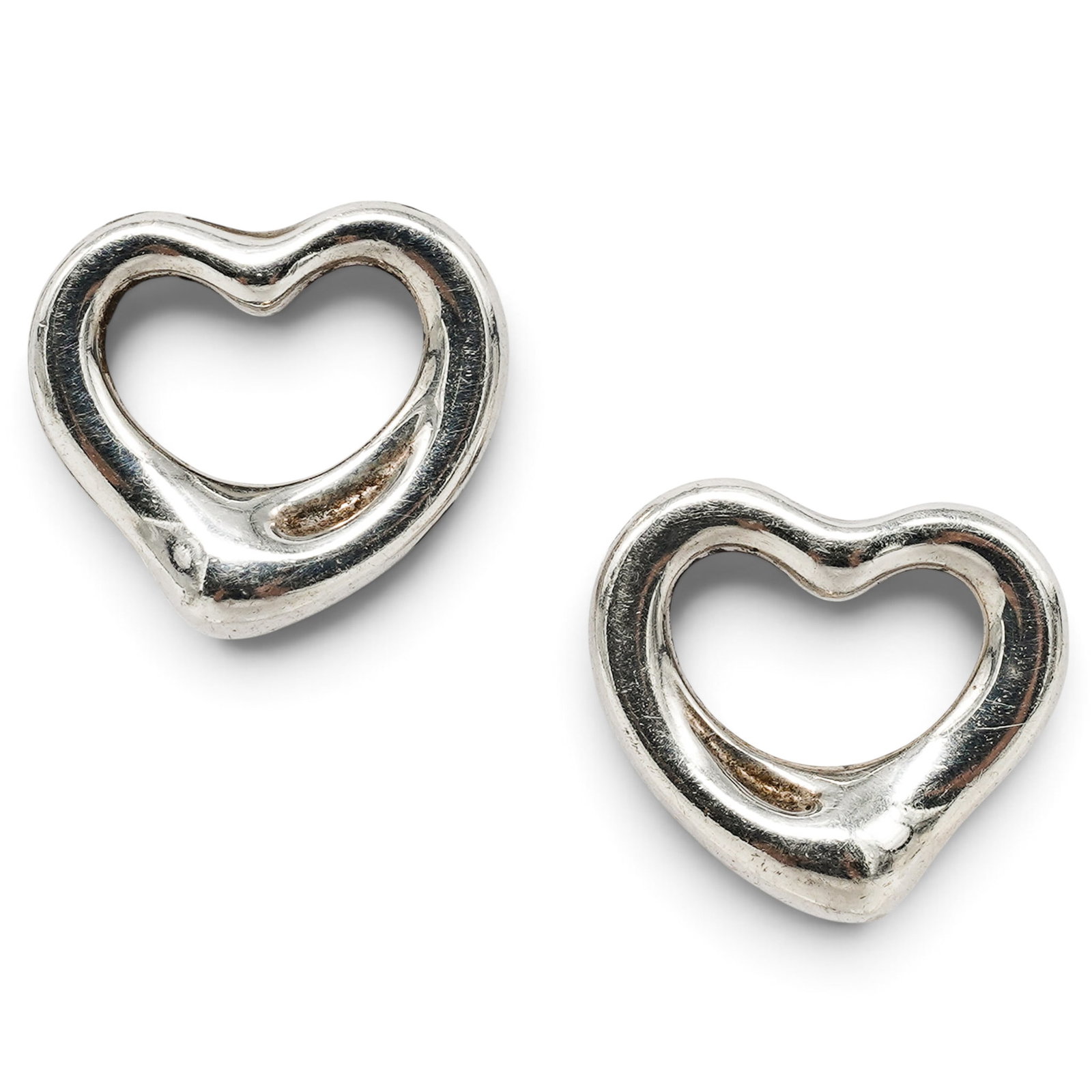 Tiffany & Co. x Elsa Peretti Sterling Silver Open Heart Earrings: Tiffany & Co. x Elsa Peretti Sterling Silver Open Heart Earrings 21st Century, Spain Artist/Designer/Manufacturer: Tiffany & Co.; Elsa Peretti. Marking(s): “TIFFANY & CO.,” “PERETTI,”