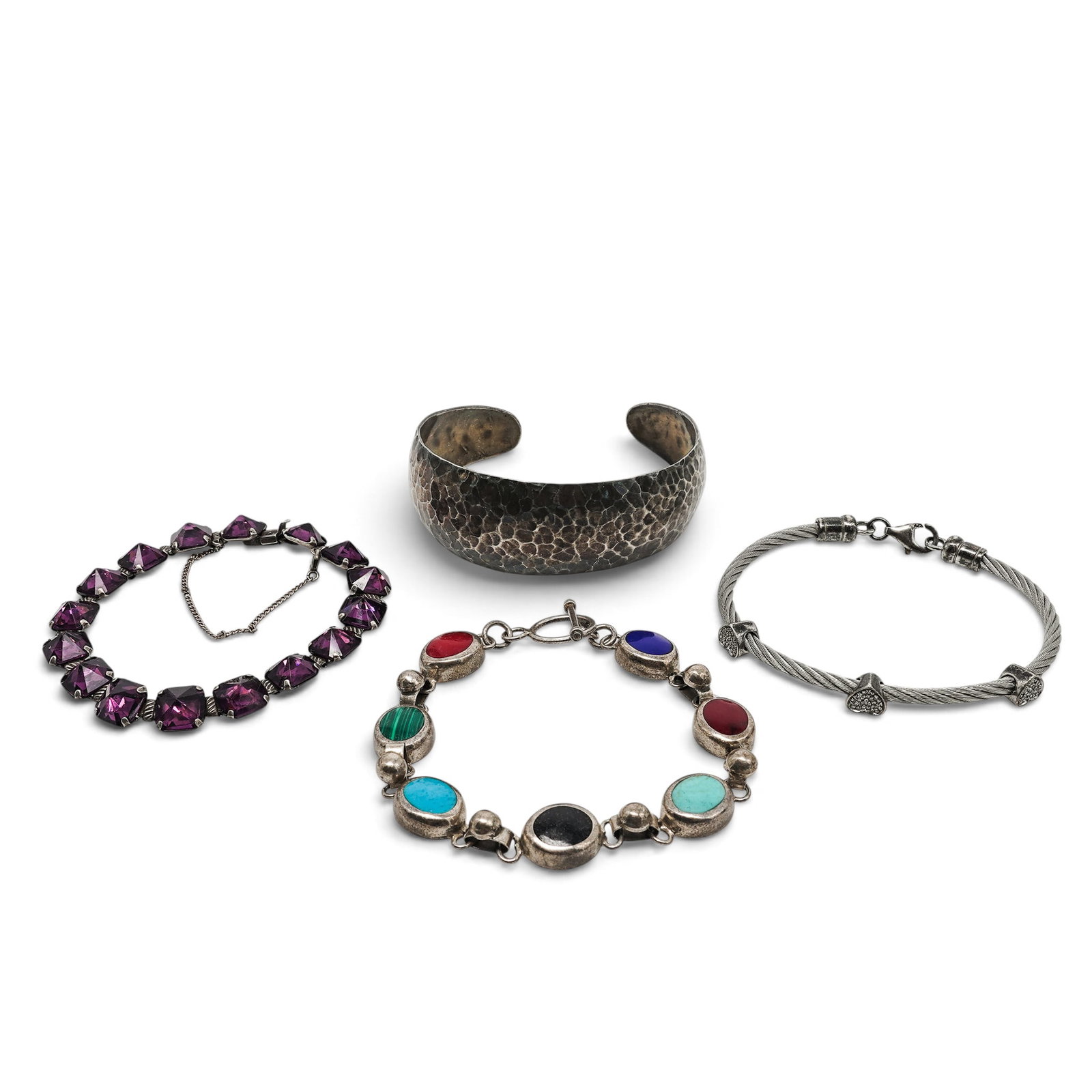 (4 Pc) Mexican Sterling Silver & Costume Bracelet Lot: (4 Pc) Mexican Sterling Silver & Costume Bracelet Lot 20th Century, Mexico & USA Artist/Designer/Manufacturer: Various. Marking(s): Cuff marked “MEXICO,” “RAP,” “TA-50,” and