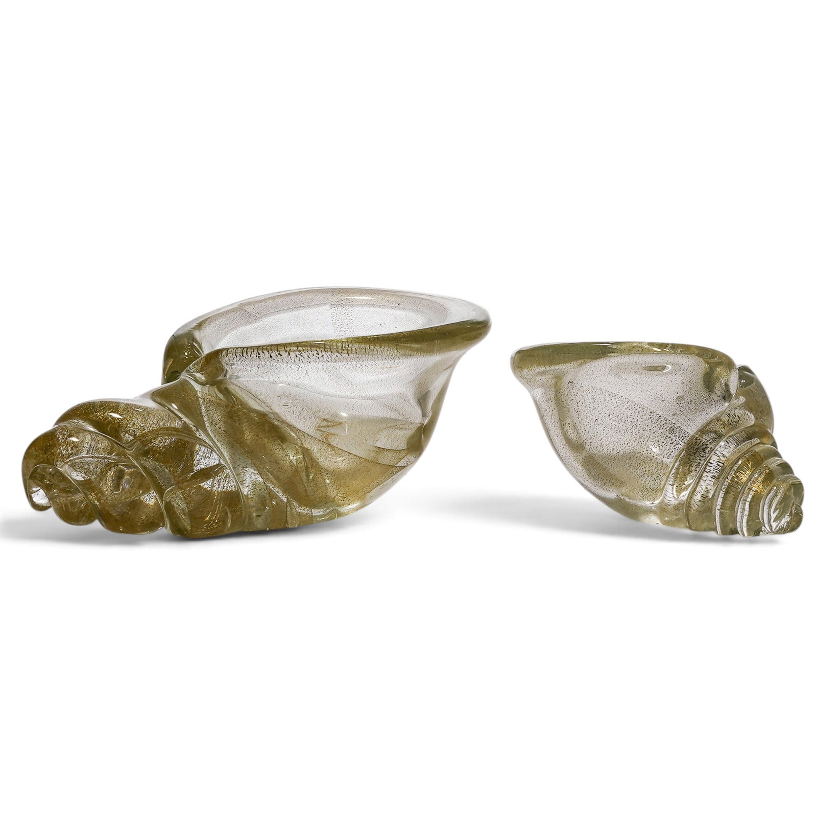 (2 pc) Seguso Murano Glass Gold Fleck Seashell Bowls: (2 pc) Seguso Murano Glass Gold Fleck Seashell Bowls Mid 20th Century, Italy Artist/Designer/Manufacturer: Unknown. Marking(s): None. Materials: Murano glass & 24k gold leaf. Cataloger Note: Vintage