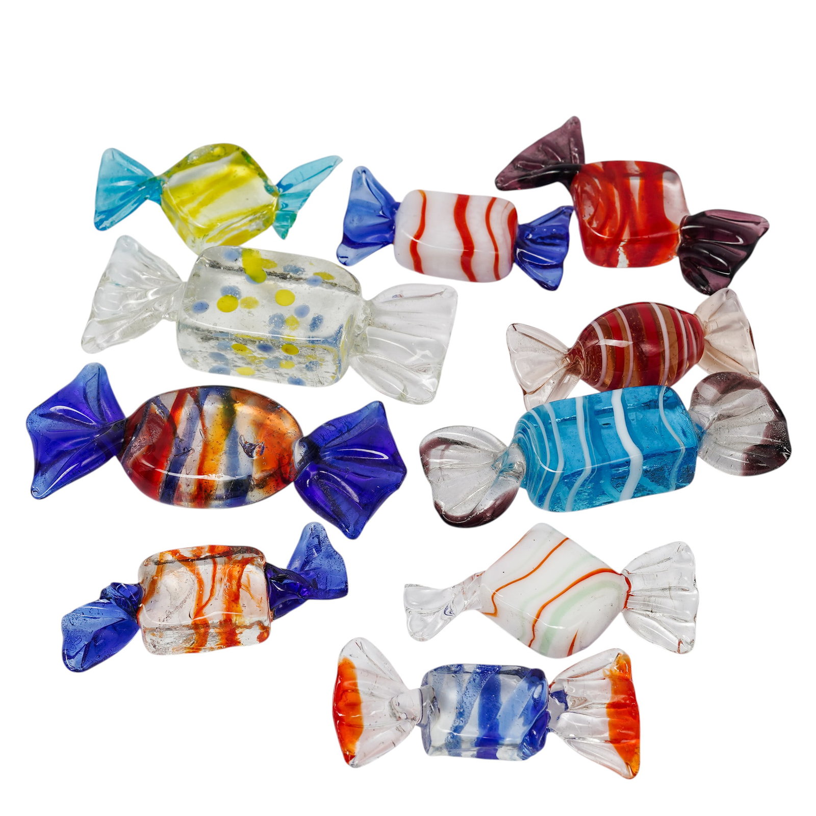 (10 pc) Murano Glass Candies: (10 pc) Murano Glass Candies Mid-20th Century, Italy Artist/Designer/Manufacturer: Unknown. Marking(s): None. Materials: Murano glass. Cataloger Note: Group of Murano glass candies showcasing various