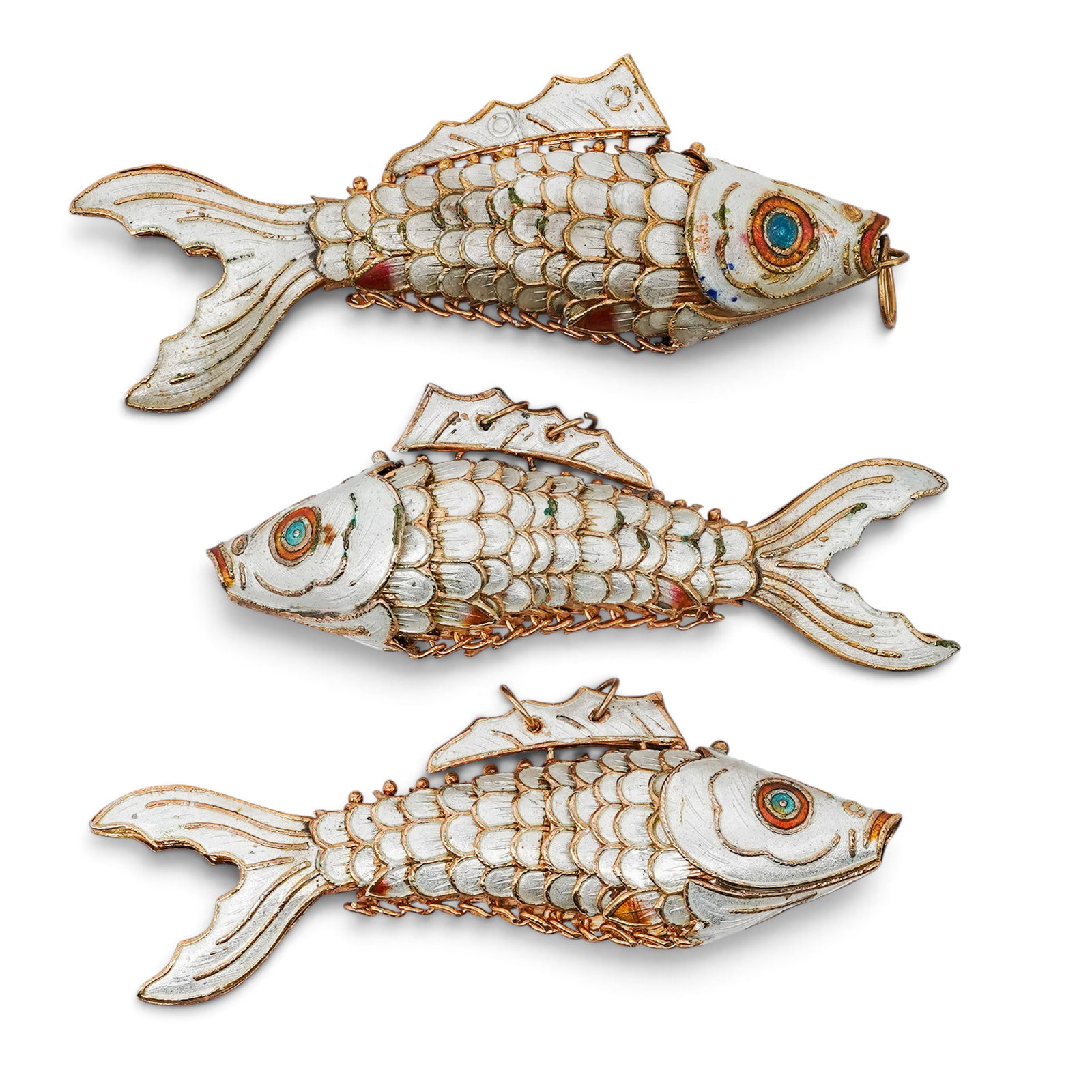 (3 pc) Vintage Chinese Gilt & Cloisonne White Enamel Fish Pendants: (3 pc) Vintage Chinese Gilt & Cloisonne White Enamel Fish Pendants Mid 20th Century, China Artist/Designer/Manufacturer: Unknown. Marking(s): None. Materials: Gilt metal & enamel. Cataloger Note: Grou