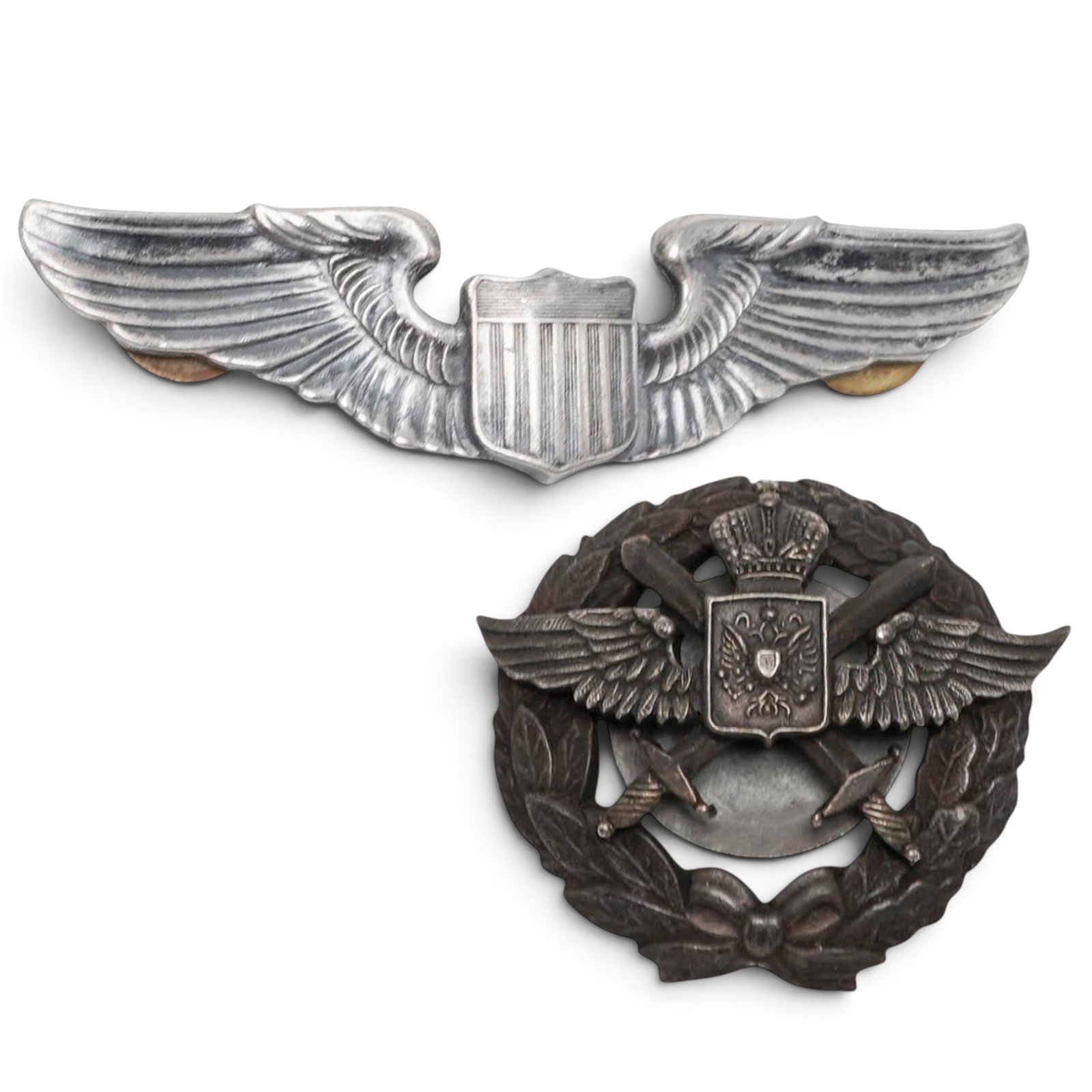 (2 pc) Vintage Military Pins: (2 pc) Vintage Military Pins 20th century Artist/Designer/Manufacturer: Unknown Marking(s): None. Materials: Metal Cataloger Note: Collection of vintage military pins. L 1.75"- 3.25"