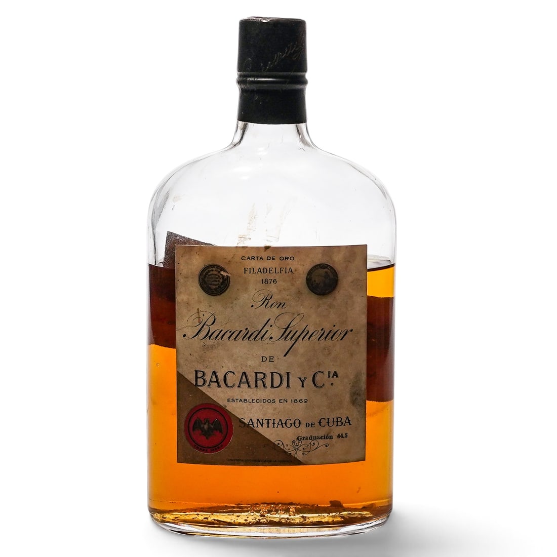 Bacardi y Compania Santiago de Cuba Ron Superior Carta de Oro Bottle: Bacardi y Compania Santiago de Cuba Ron Superior Carta de Oro Bottle c. 1940s- 1950s, Cuba Artist/Designer/Manufacturer: Bacardi y Compañía Marking(s): “Ron Bacardi Superior Carta de Oro”; S