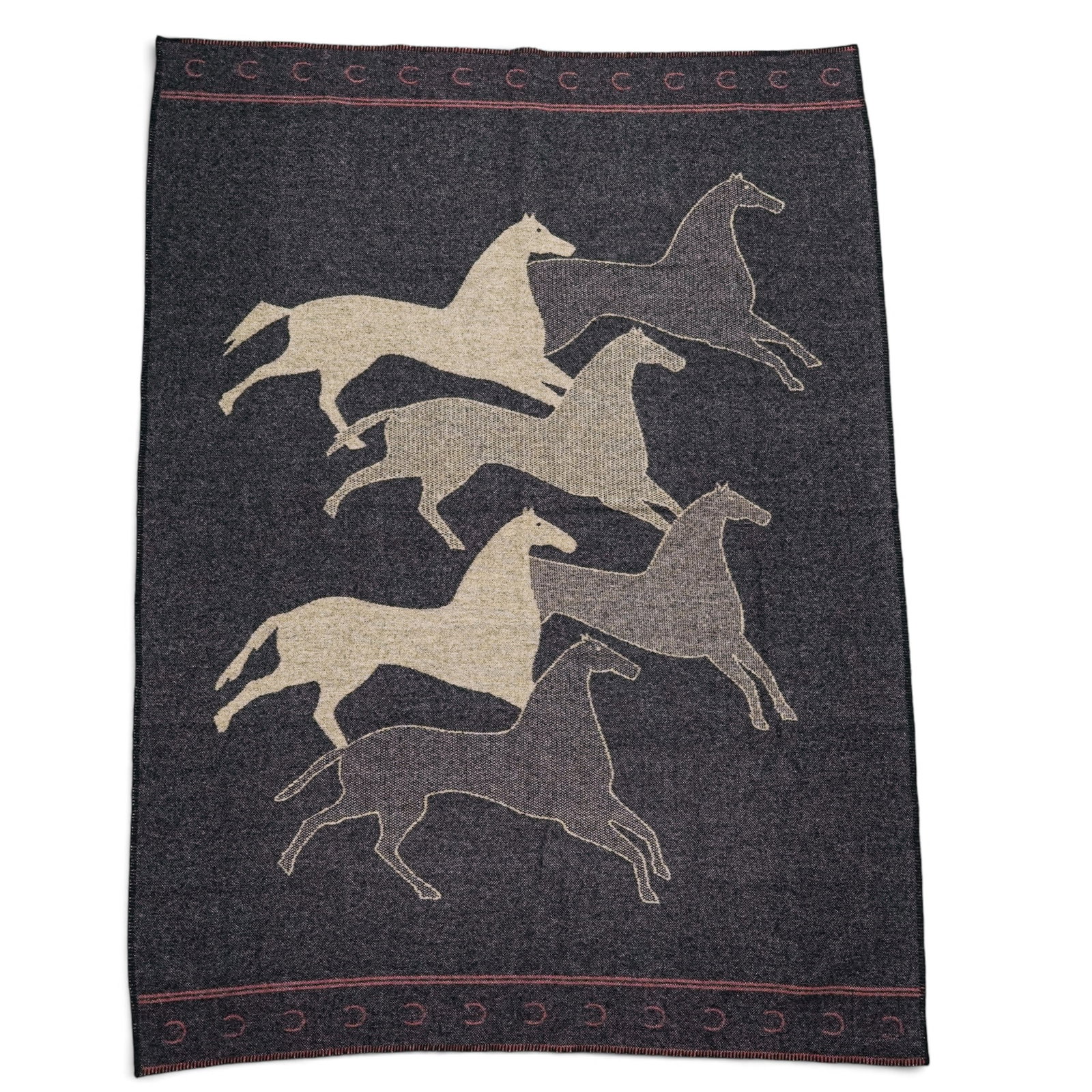 Wellspring Legend Running Horses Wool Blanket: Wellspring Legend Running Horses Wool Blanket Late 20th Century, USA Artist/Designer/Manufacturer: Wellspring Legend Robes Marking(s): Wellspring tag at one corner. Materials: Wool Cataloger Note: