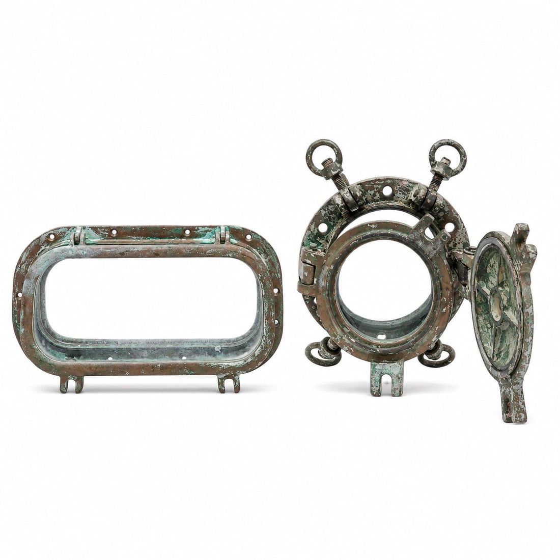(2 pc) Bronze Nautical Port Holes: (2 pc) Bronze Nautical Port Holes Early - Mid 20th Cent, USA Artist/Designer/Manufacturer: Perko (rectangular port hole) Marking(s): “PERKO” manufacturer’s mark to rectangular port hole. Mat