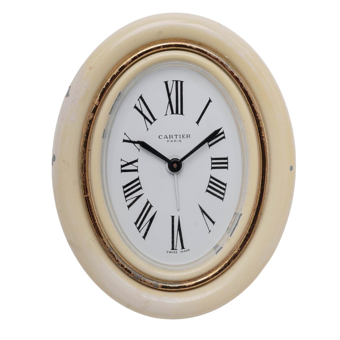 Cartier Oval Desk Clock: Cartier Oval Desk Clock 20th century Artist/Designer/Manufacturer: Cartier Marking(s); notes: Marked verso “7509 22992 Swiss Made” Materials: metal, glass Cataloger Note: Cartier Swiss-made