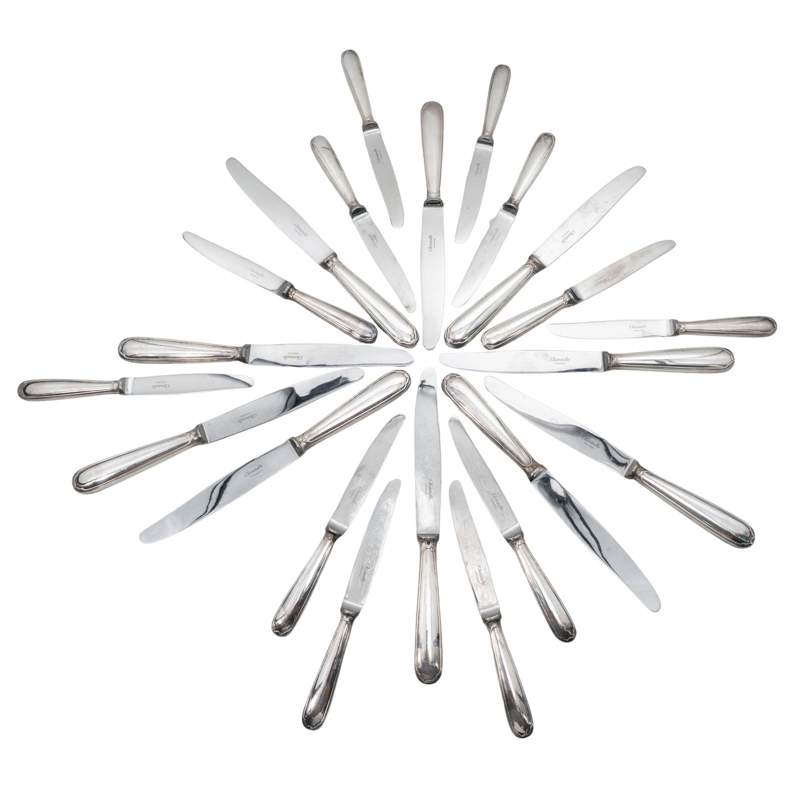 (24 pc) Christofle Silver Plated 'America' Dinner Knife Set: (24 pc) Christofle Silver Plated 'America' Dinner Knife Set 20th Century, France Collection of twenty-four Christofle silver-plated knives in the iconic America pattern, comprising dessert knives and 