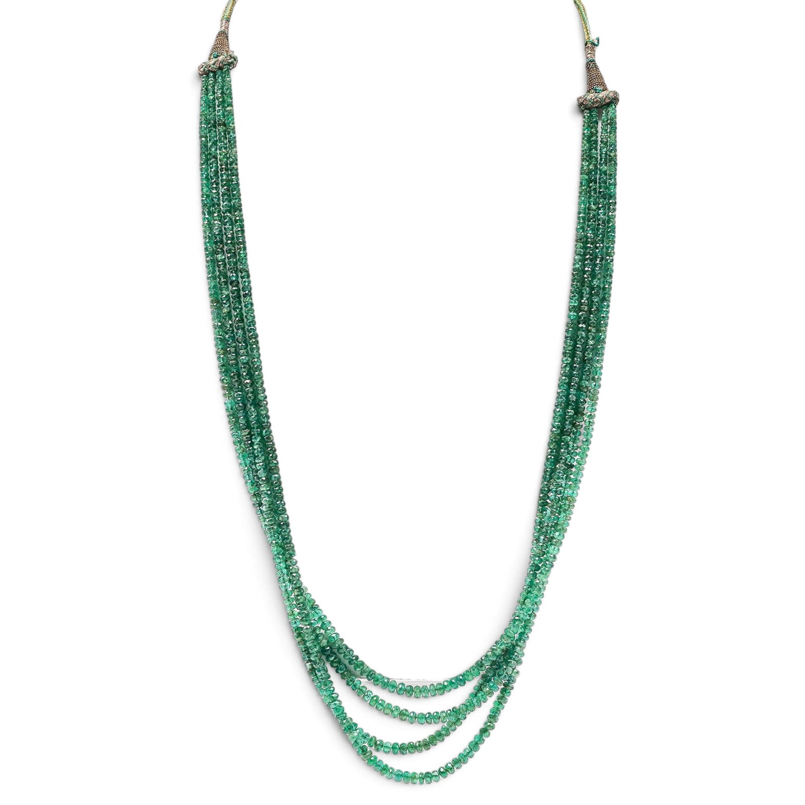 Multi-Strand Emerald Bead Necklace: Multi-Strand Emerald Bead Necklace Mid-Late 20th Century, Indian Multi-strand necklace of small faceted green emerald beads, finished with green and gold cord tassel ends. Stones: Emeralds Markings: T