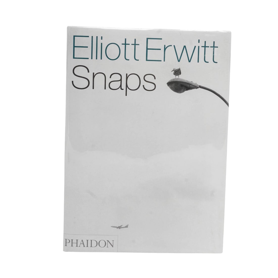 Elliott Erwitt "Snaps," By Phaidon Press. First Edition Hand-Signed Book: Elliott Erwitt "Snaps," By Phaidon Press. First Edition Hand-Signed Book 2001. American- English Artist/Designer/Manufacturer: Elliott Erwitt (French, 1928-2023) / Phaidon Press Marking(s); notes: Sig