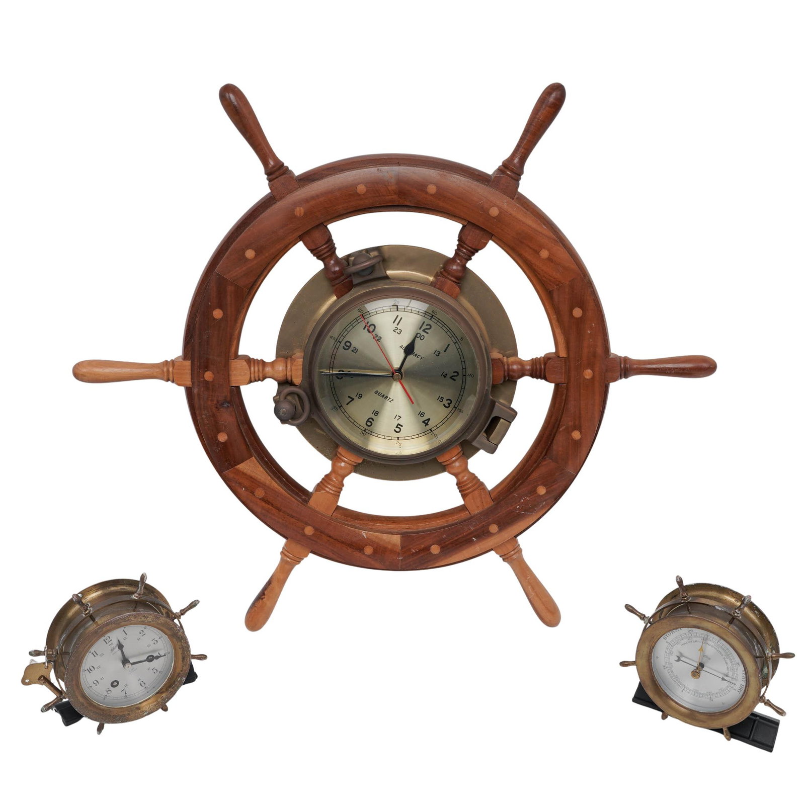 (3 pc) Wood/Brass Ship Wheel Clock & Gauges: (3 pc) Wood/Brass Ship Wheel Clock & Gauges Mid - Late 20th Cent, Europe/Southeast Asia Artist/Designer/Manufacturer: Schatz / Accuracy / Various Manufacturers Marking(s); notes: Accuracy quartz batte