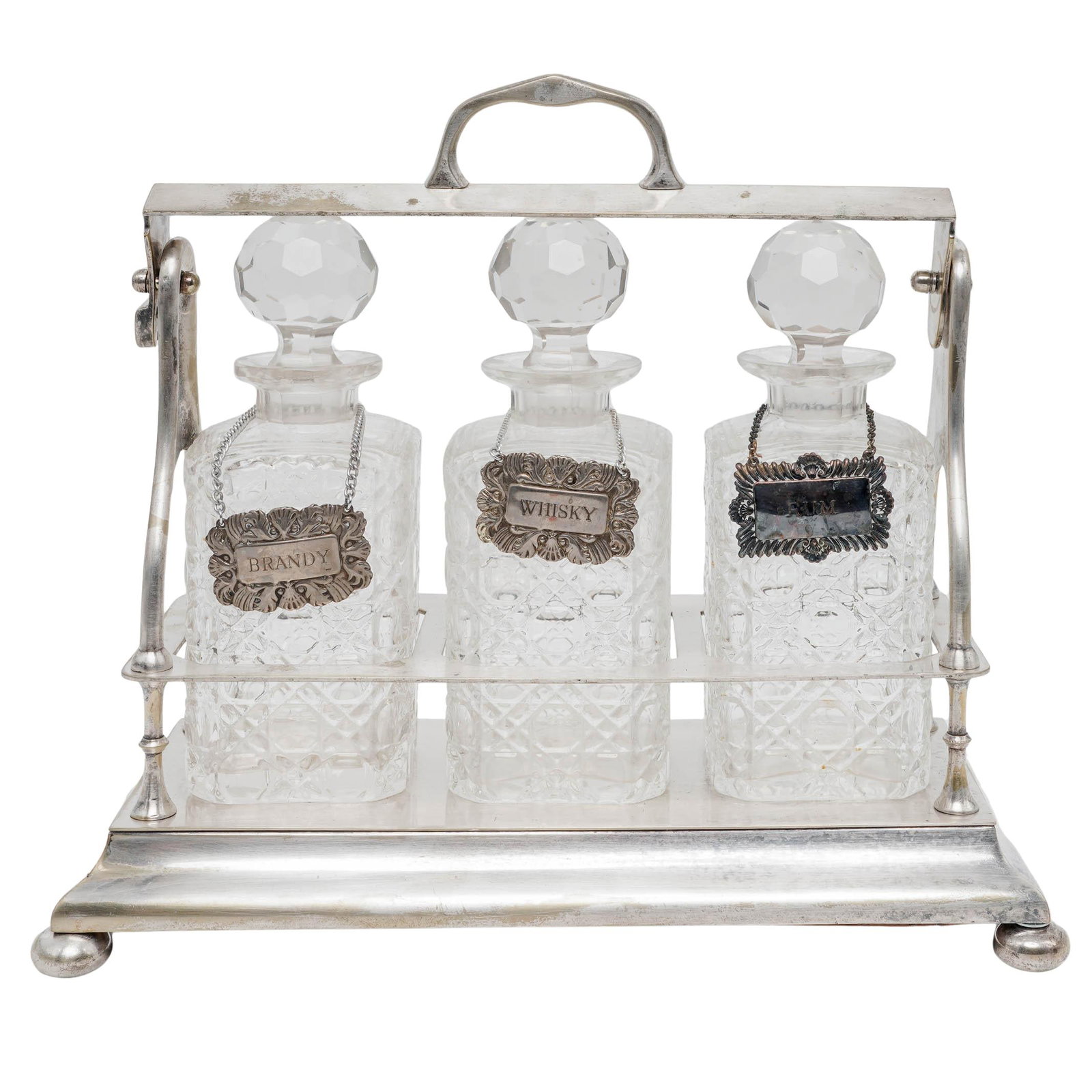 Victorian Silver-Plated Tantalus W. Decatners: Victorian Silver-Plated Tantalus W. Decatners Late 19th - Early 20th Cent, England Artist/Designer/Manufacturer: Unknown Marking(s); notes: Victorian period Materials: silver-plated metal, cut crystal