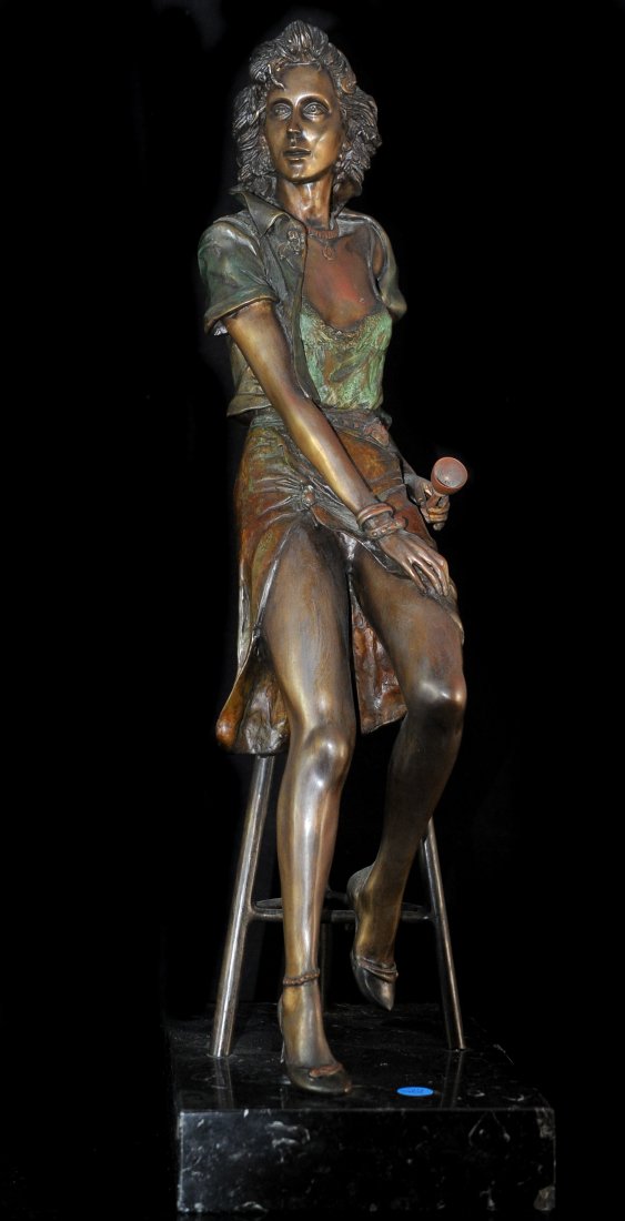 Richard Shiloh Israeli Bronze Statue: DESCRIPTION: Richard Shiloh bronze statue of a lady sitting down on a stool holding a goblet, dressed in a green, stylish jacket, an open skirt and high heals. Bronze is footed on a heavy black marble