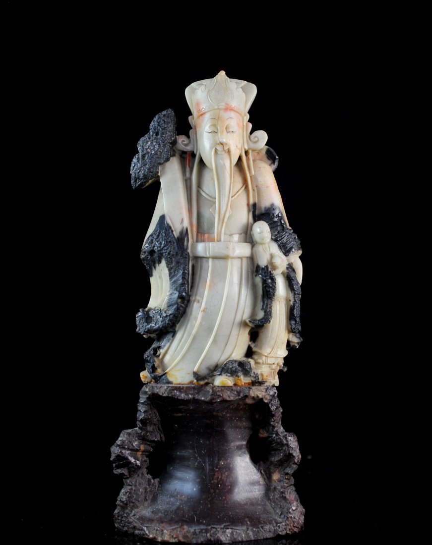 Large Antique Carved Soapstone King: DESCRIPTION: Large antique hand carved soapstone multi color figurne of Chinese King with young child leaning on him, standing on dark brwonish soapstone base. CIRCA: 19/20th ct ORIGIN: China DIMENSIO